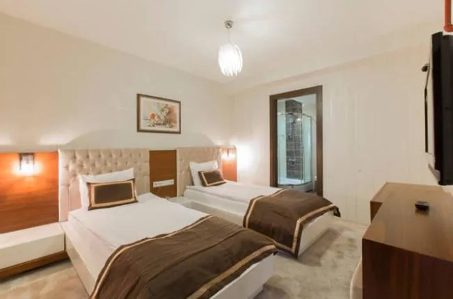 Bed in Golf Royal Residence