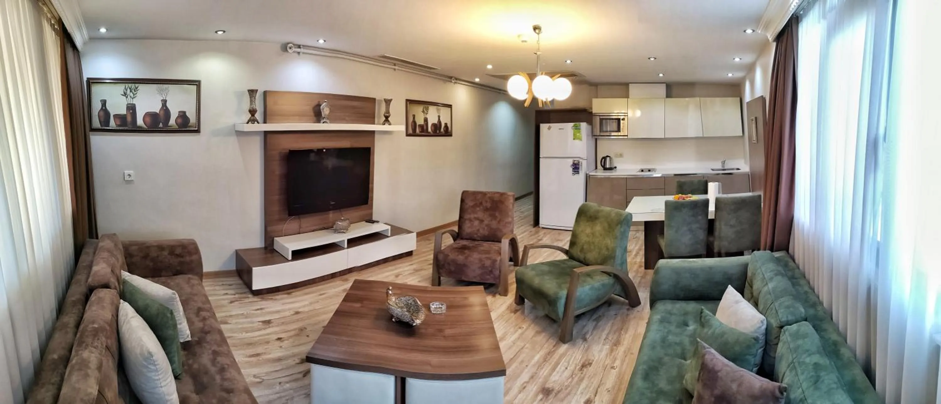 Communal lounge/ TV room in Golf Royal Residence