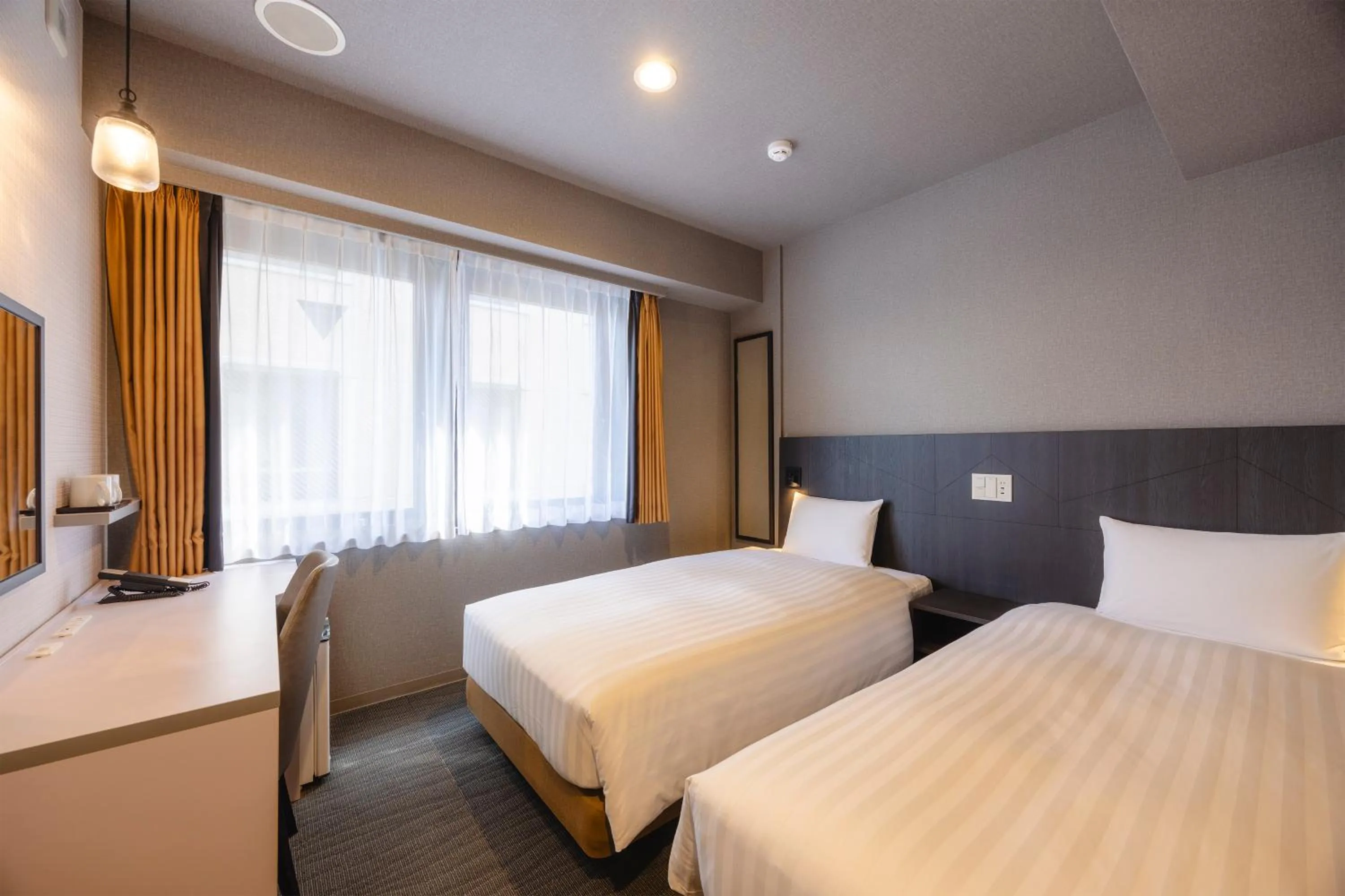 Photo of the whole room, Bed in KOKO HOTEL Shimbashi Onarimon - formerly Hotel Wing International Shimbashi Onarimon