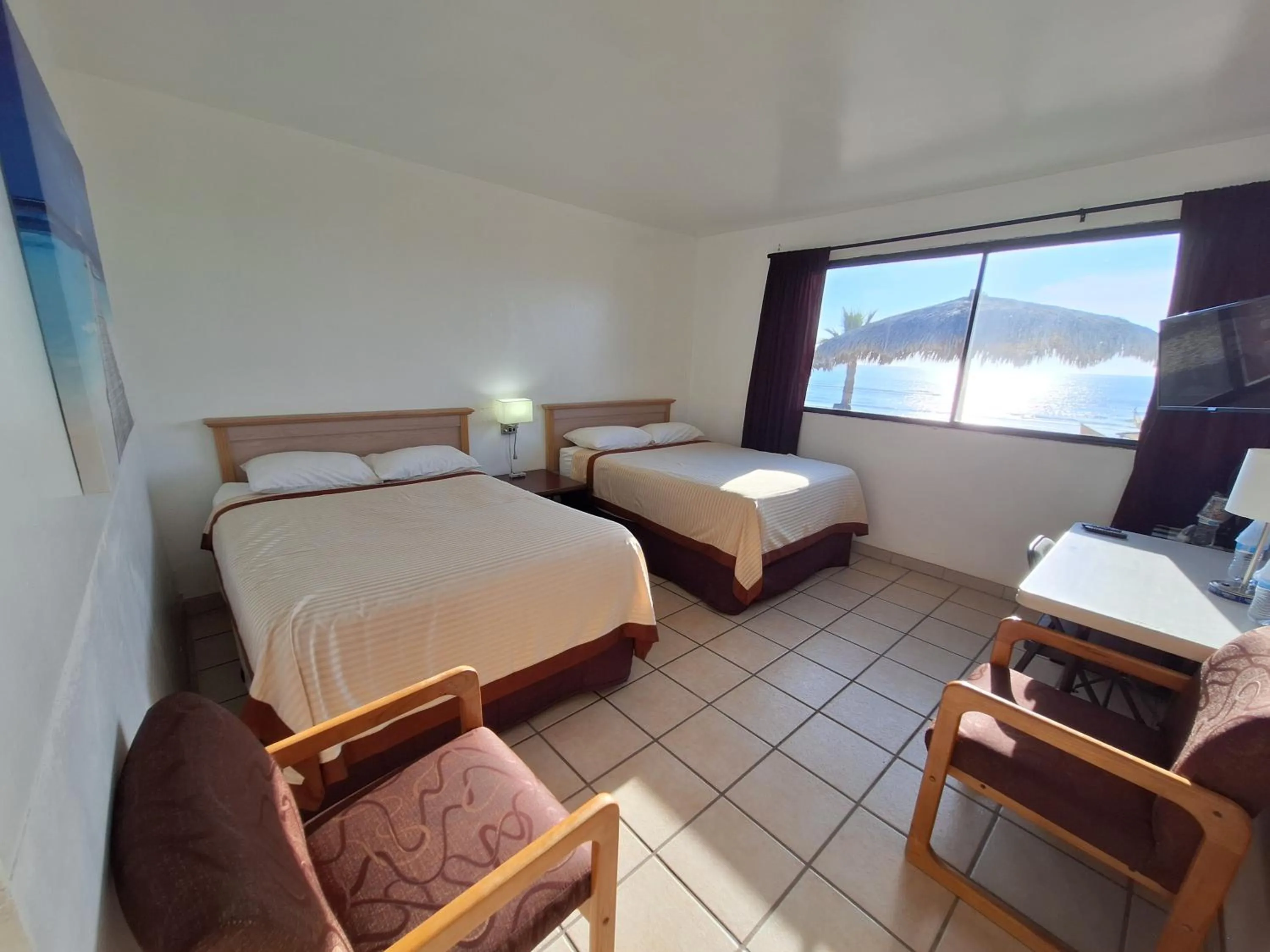 Bed in #38 Bungalow Seaside Hotel & Victors RV Park