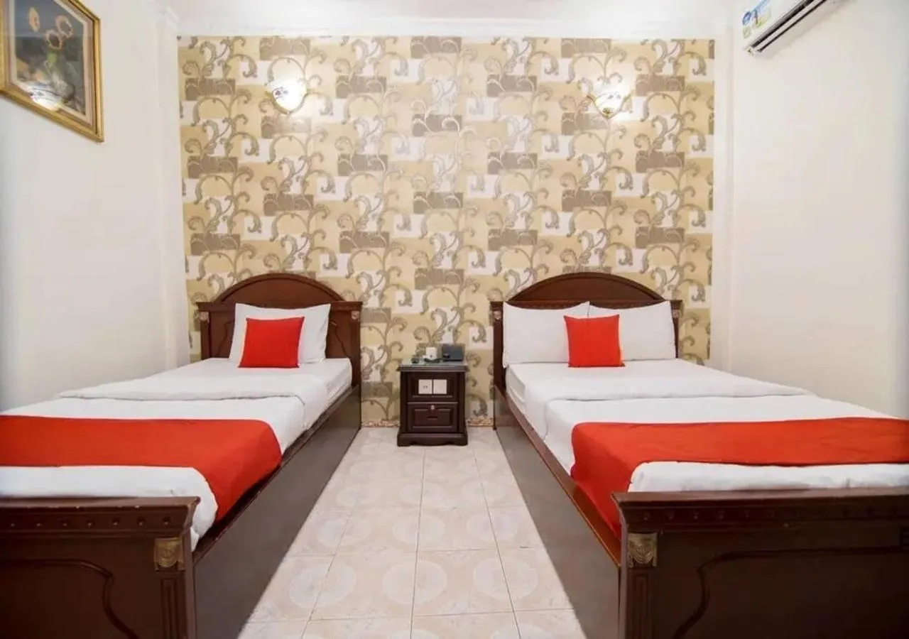 Bed in Tan Hoang Long Hotel