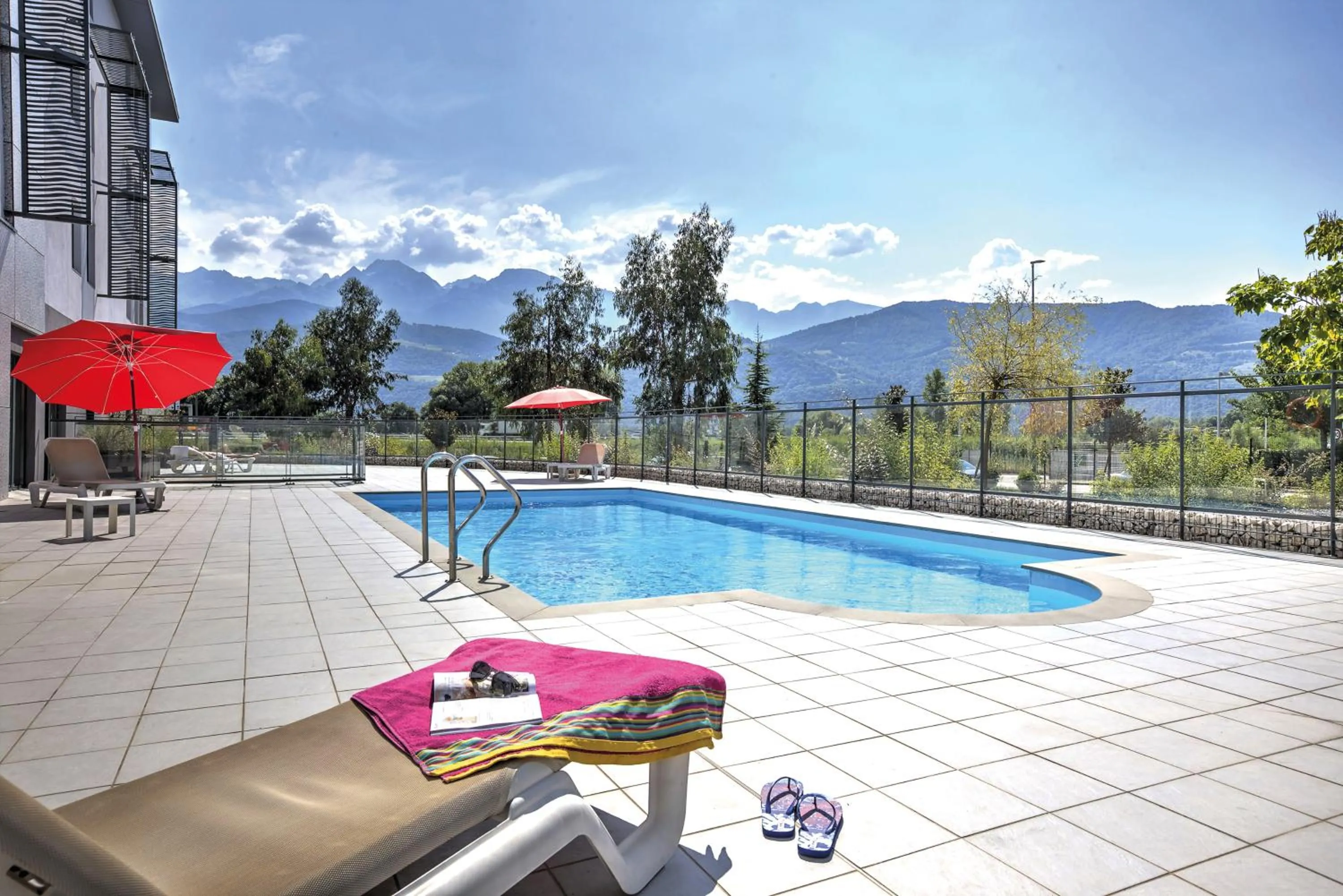 Swimming pool in Appart'City Confort Grenoble Inovallée