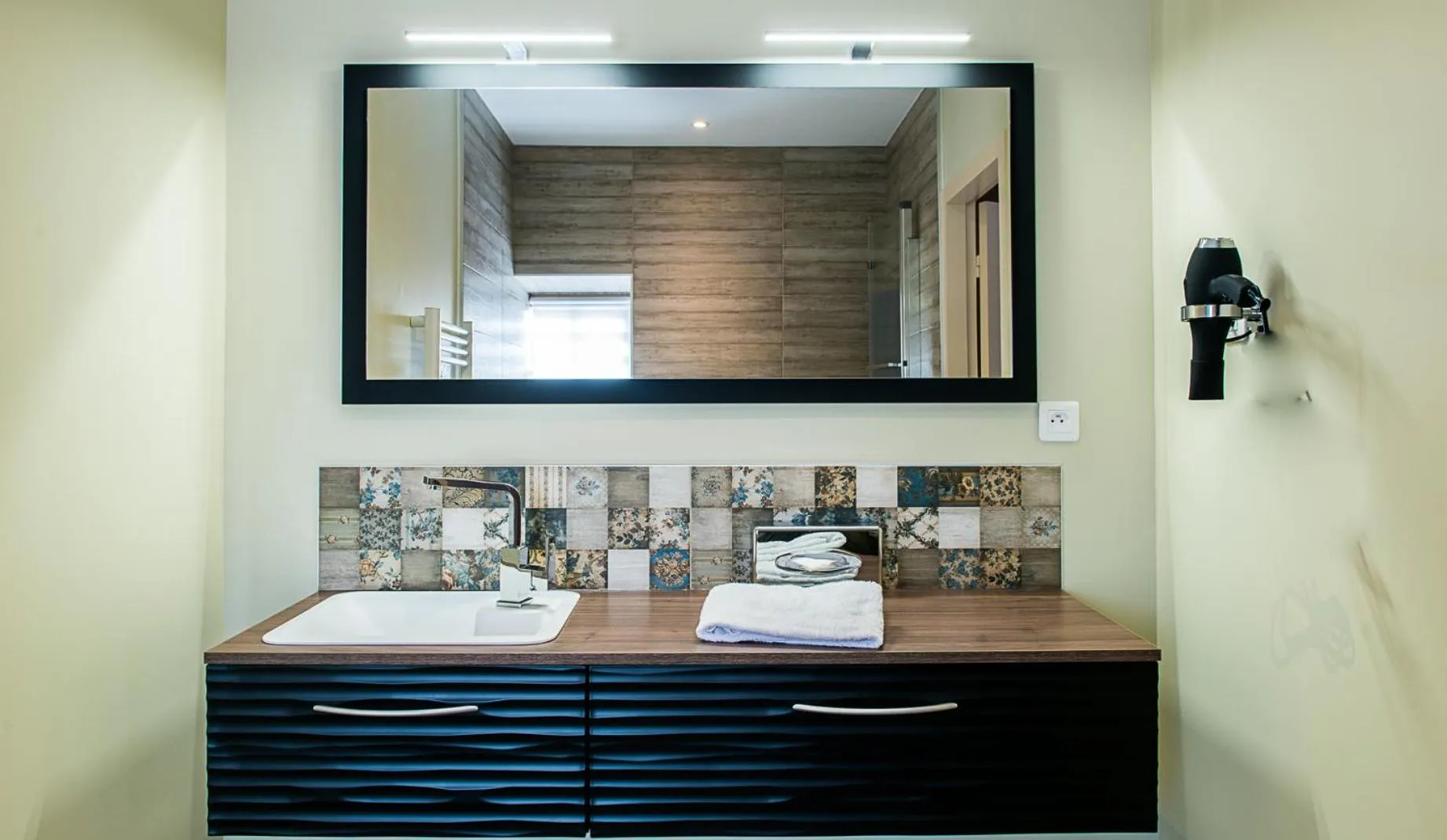 Bathroom in Demeures et Chateaux l'Abbaye Caladoise - Anciennement Hostellerie Ferme du Poulet
