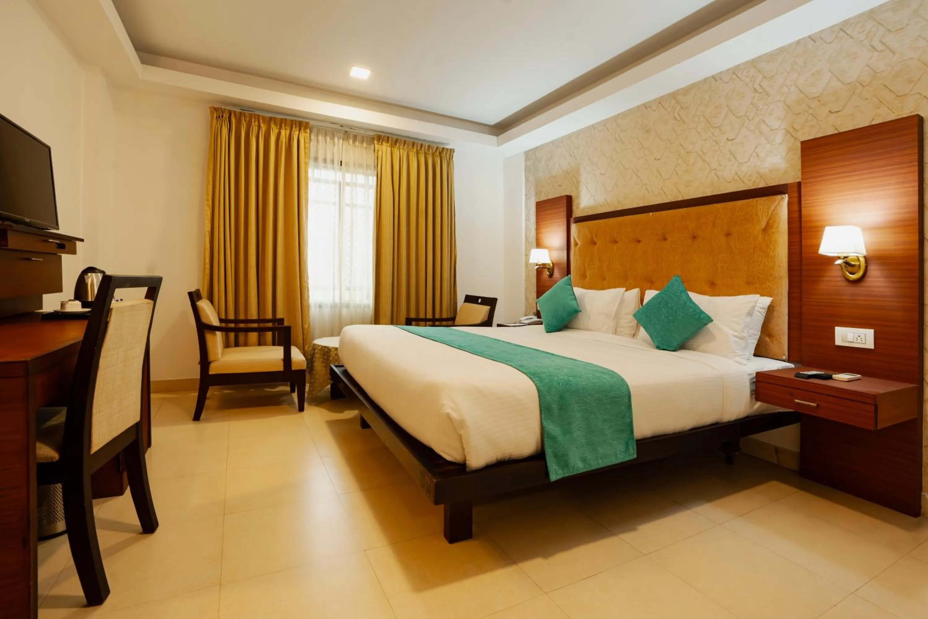 Bedroom, Bed in Hotel White Gate Residency -near to Vaikom Sri Mahadeva Temple