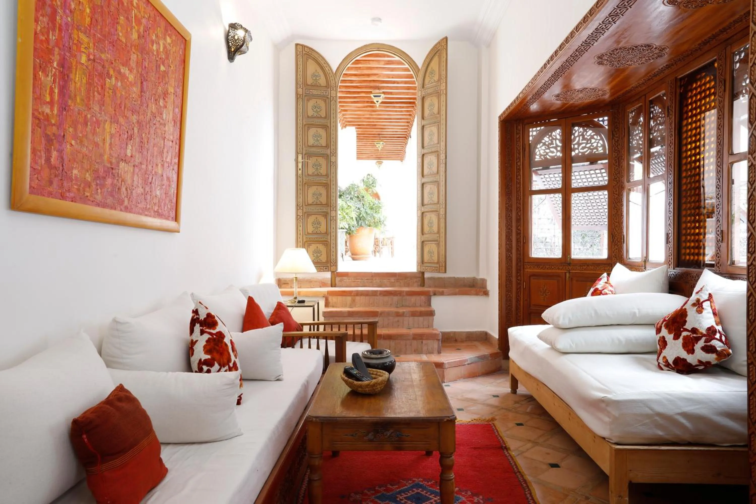 Communal lounge/ TV room, Bed in Riad Daria Suites & Spa