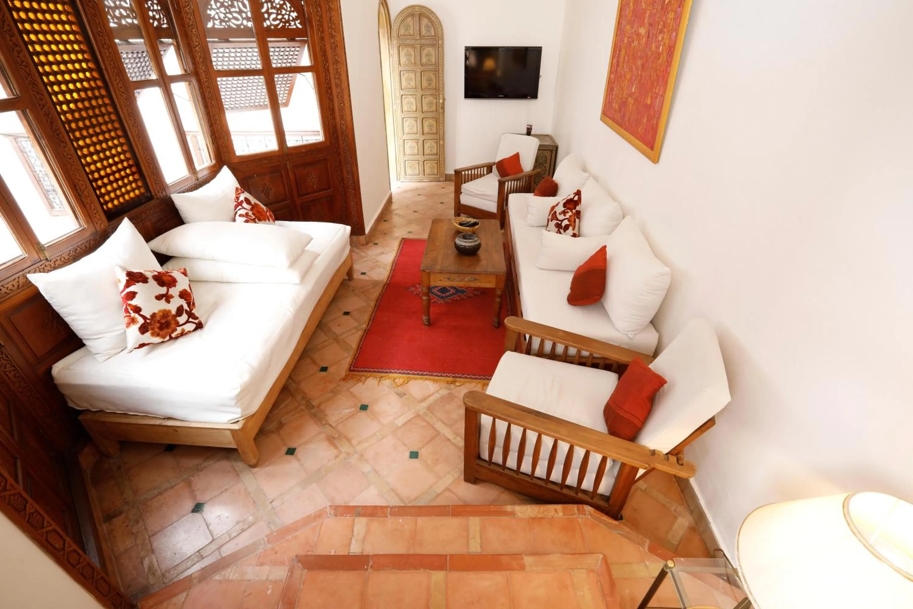 Communal lounge/ TV room, Bed in Riad Daria Suites & Spa
