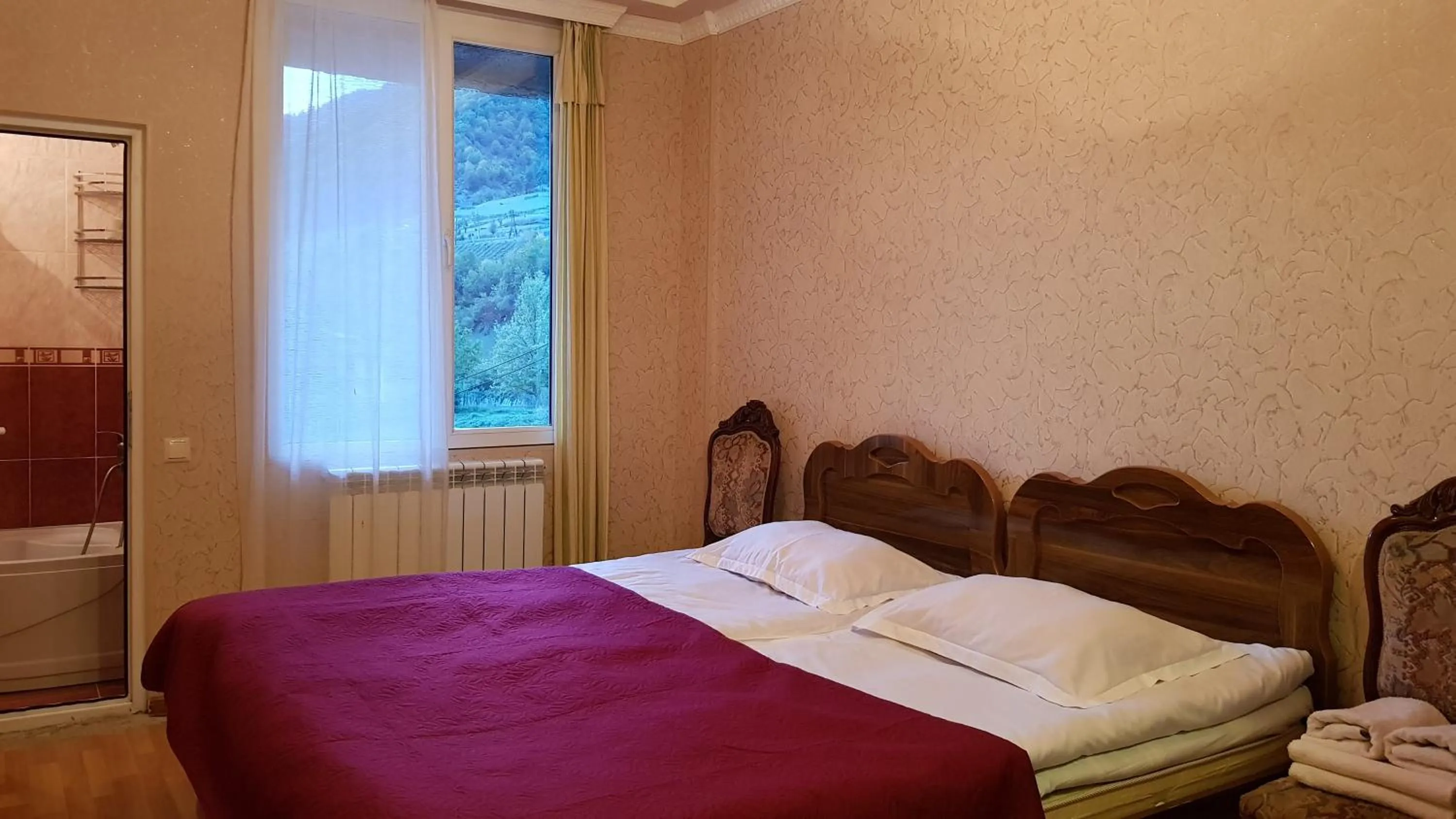 Photo of the whole room, Bed in Hilltop Mestia