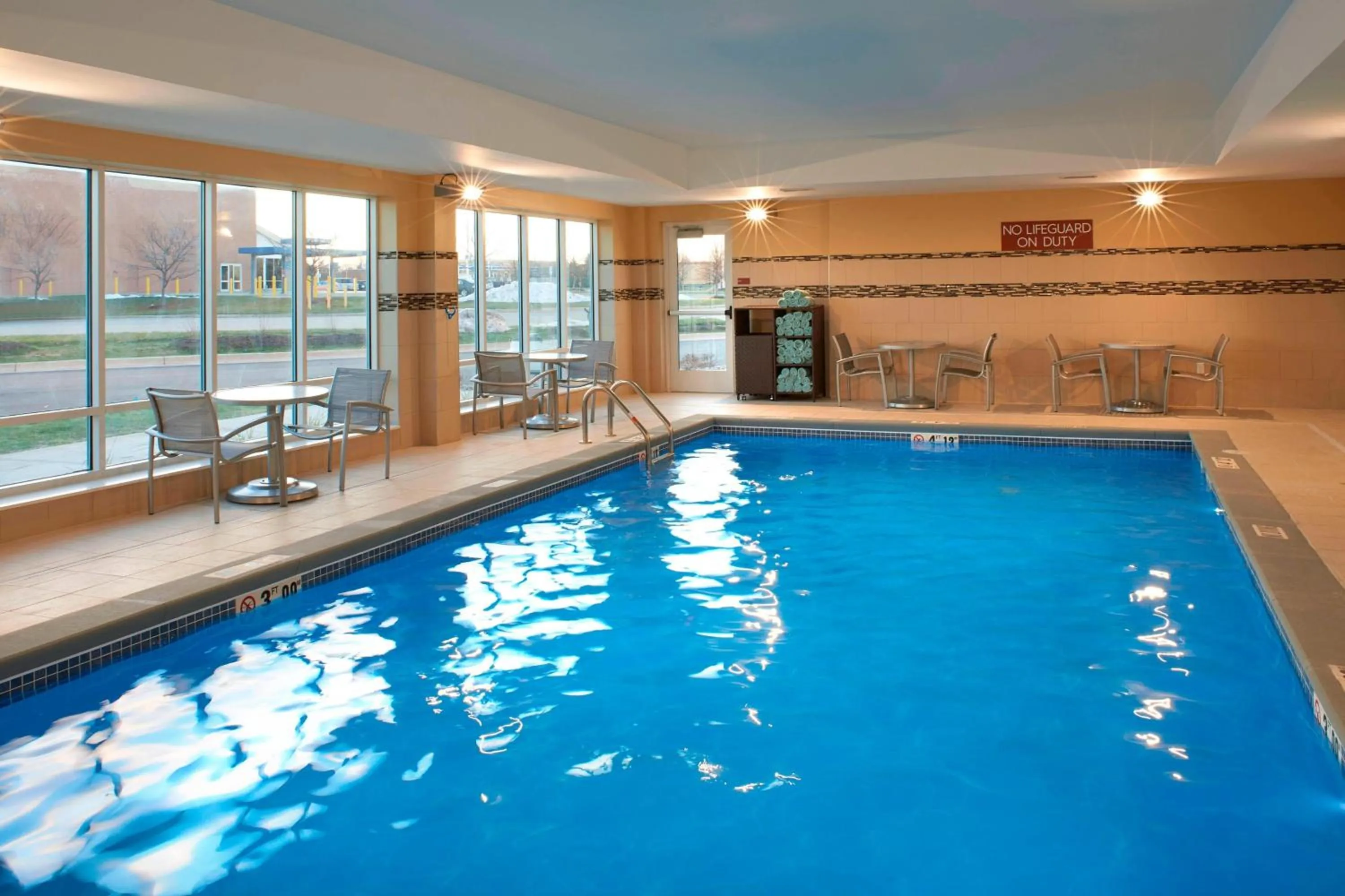 Swimming pool in TownePlace Suites by Marriott Grand Rapids Airport