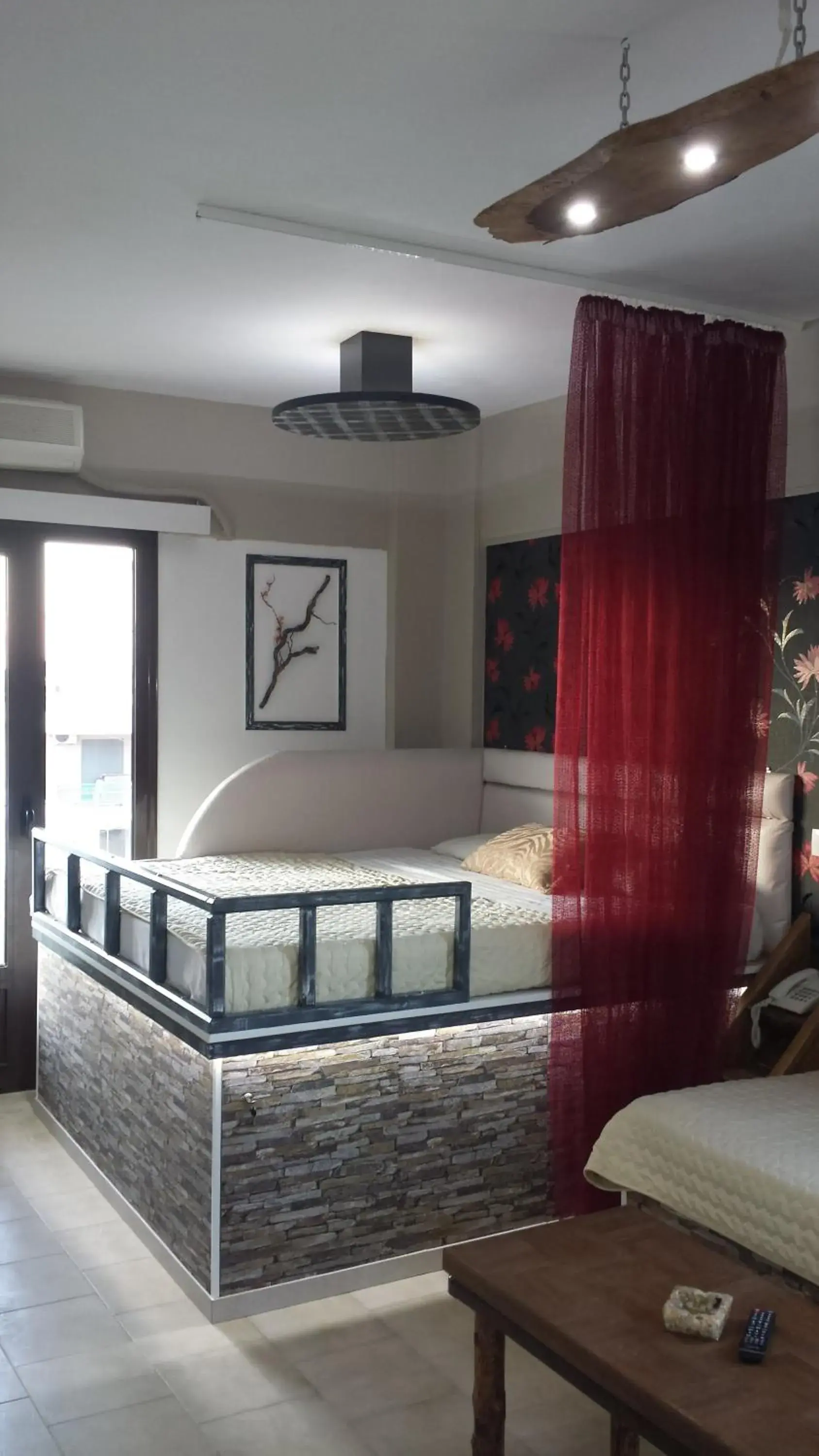 Quadruple Room with Balcony in Takis Hotel Apartments Quadruple Room with Balcony in Takis Hotel Apartments