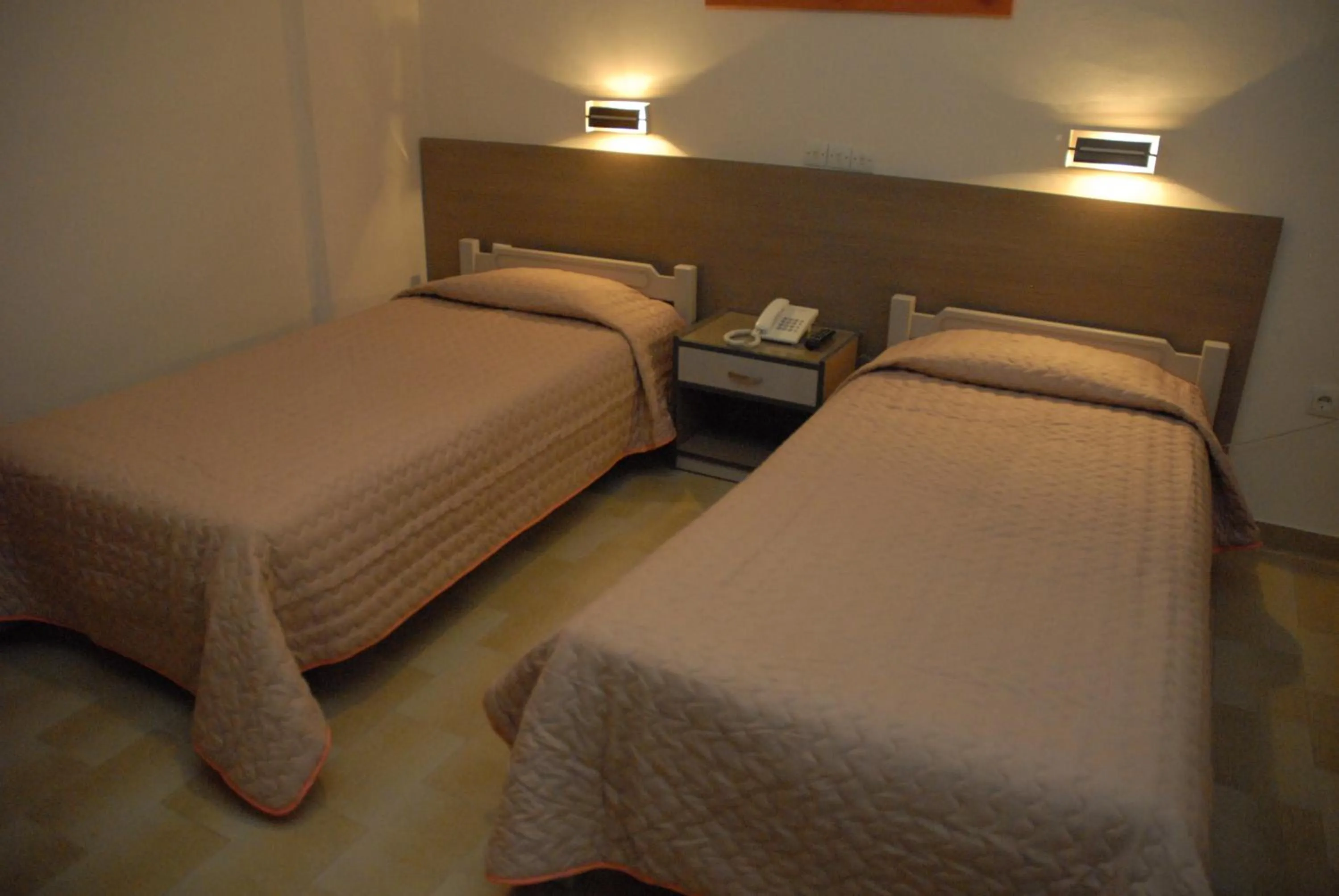 Bed in Takis Hotel Apartments