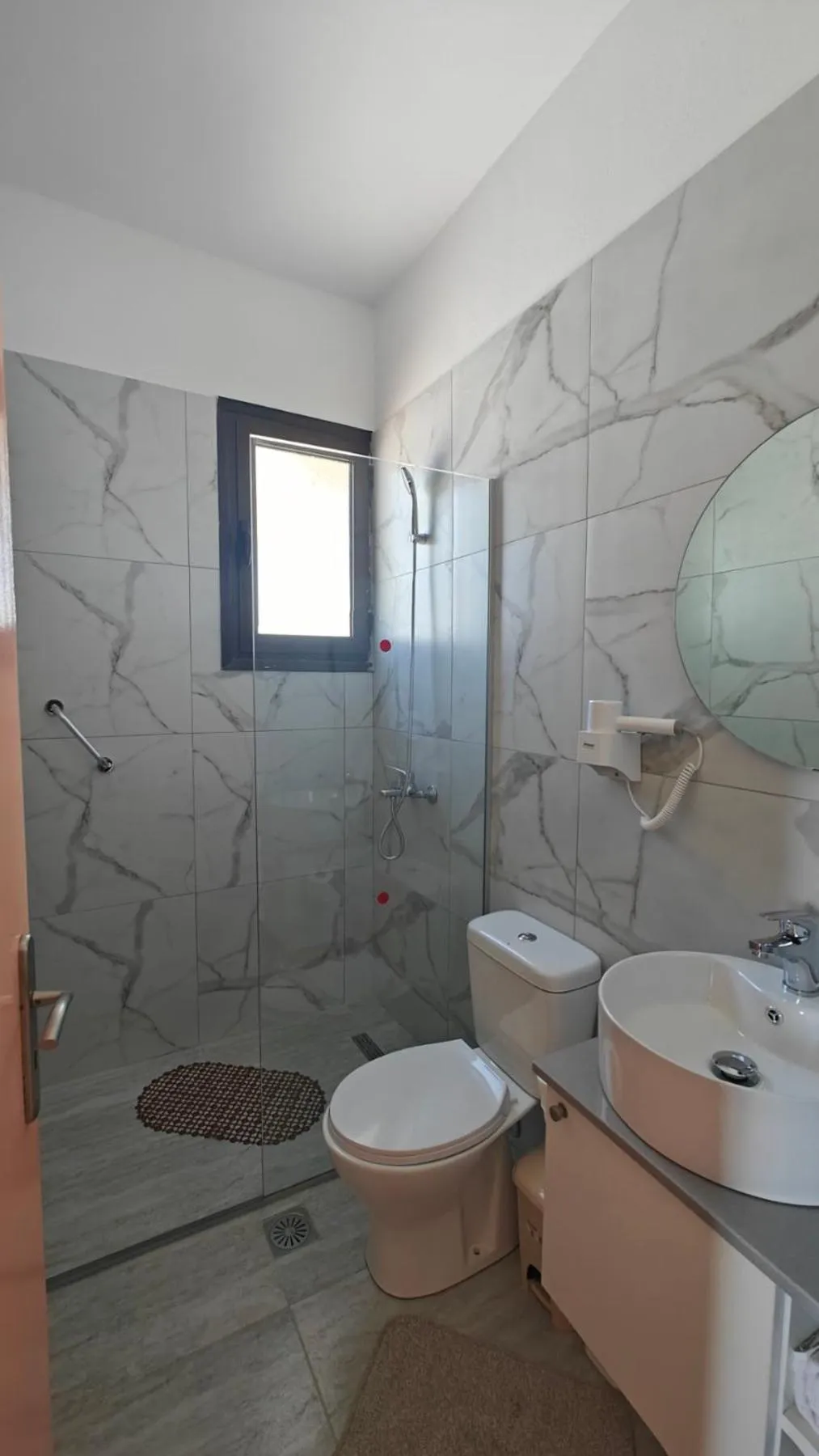 Bathroom in Takis Hotel Apartments