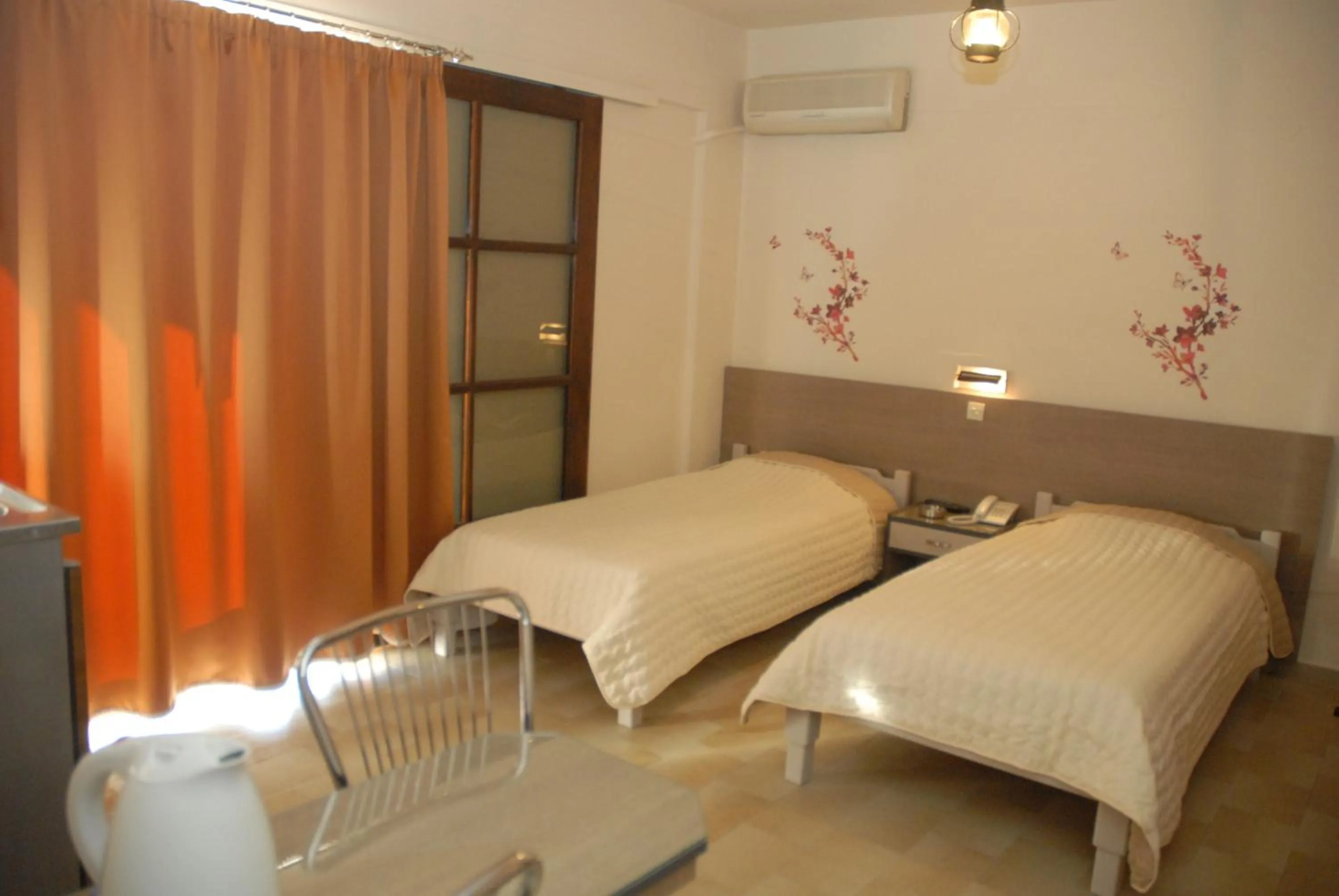 Bedroom in Takis Hotel Apartments