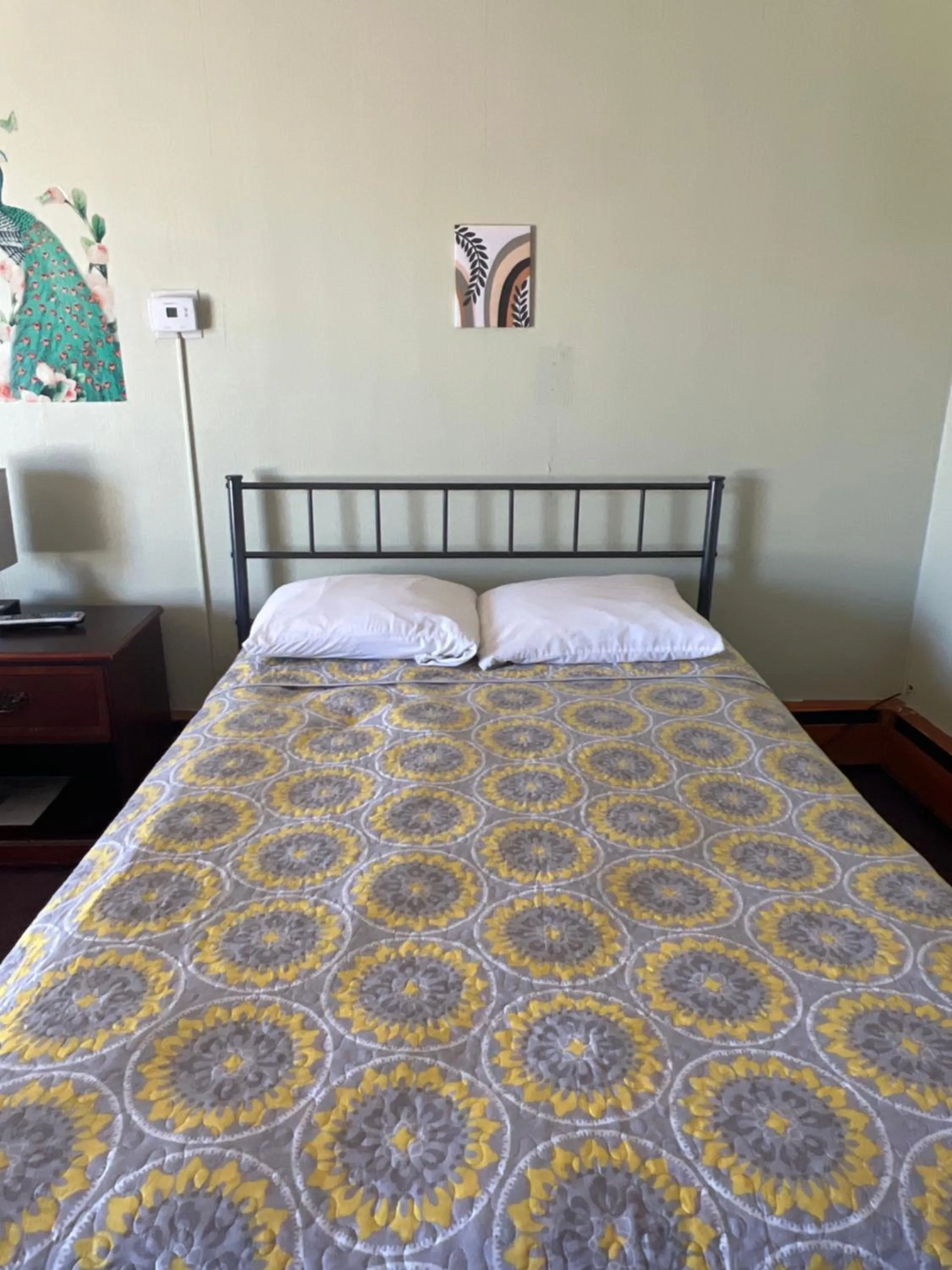 Bed in Mid-town Motel