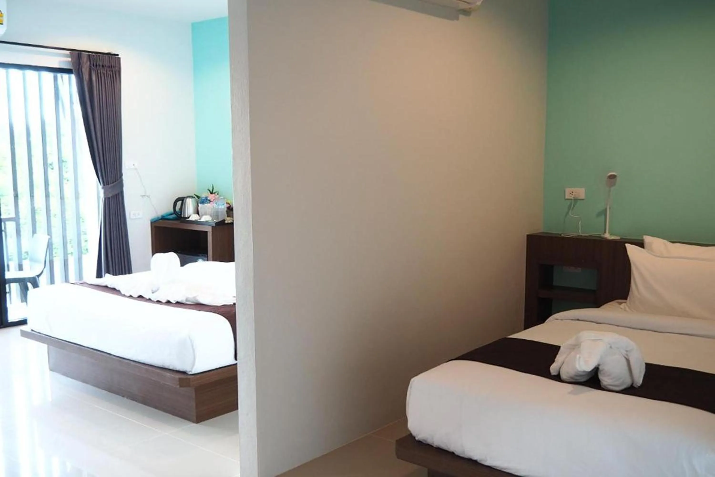 Photo of the whole room, Bed in Friendly Hotel Krabi