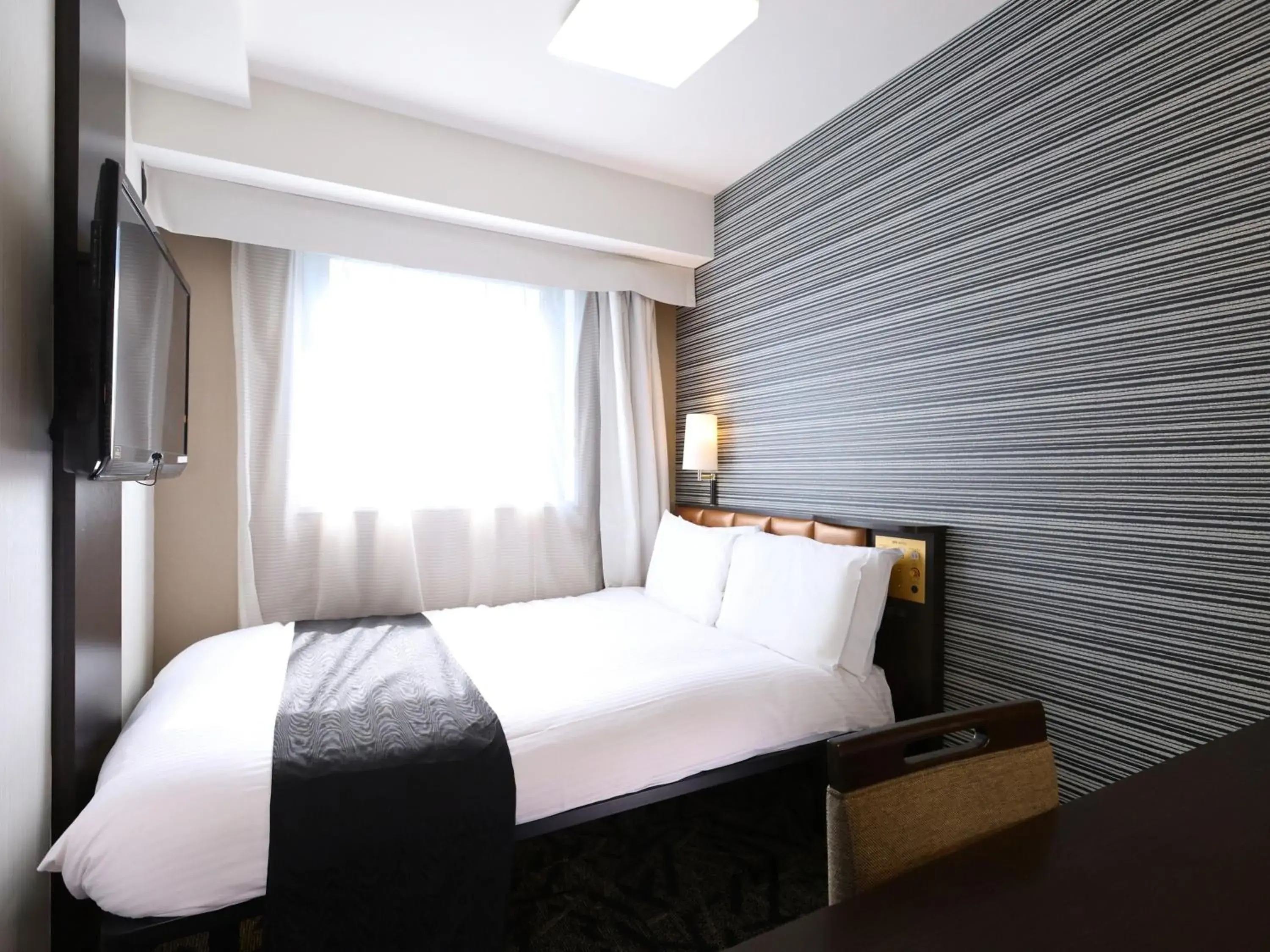 Bed in APA Hotel Mita Ekimae Bed in APA Hotel Mita Ekimae