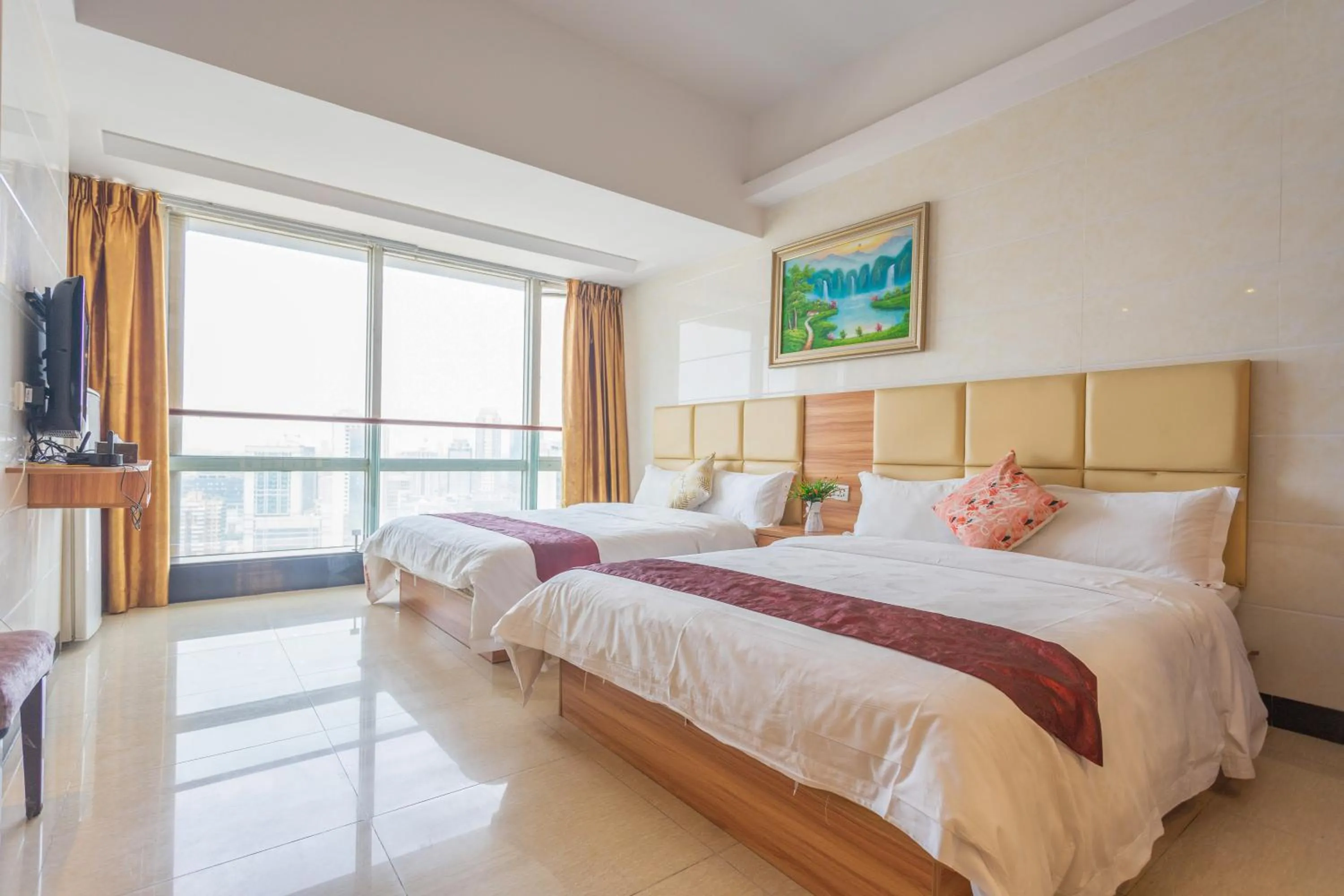 Bed in Sunny International Apartment From Beijing Road