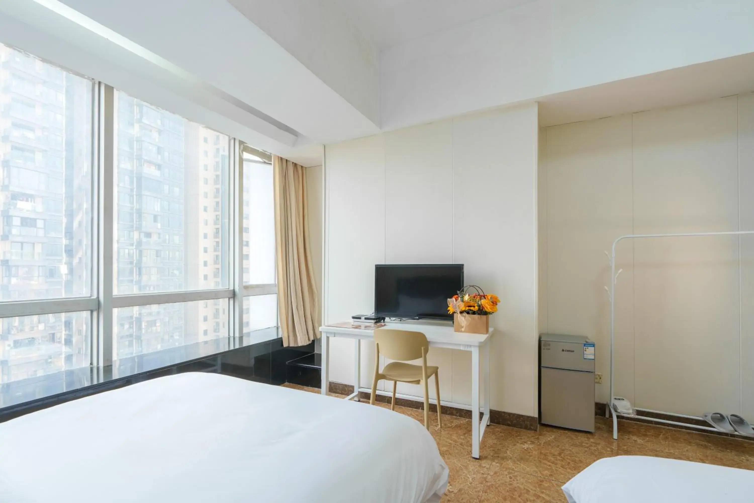 Property building, Bed in Sunny International Apartment From Beijing Road Property building, Bed in Sunny International Apartment From Beijing Road
