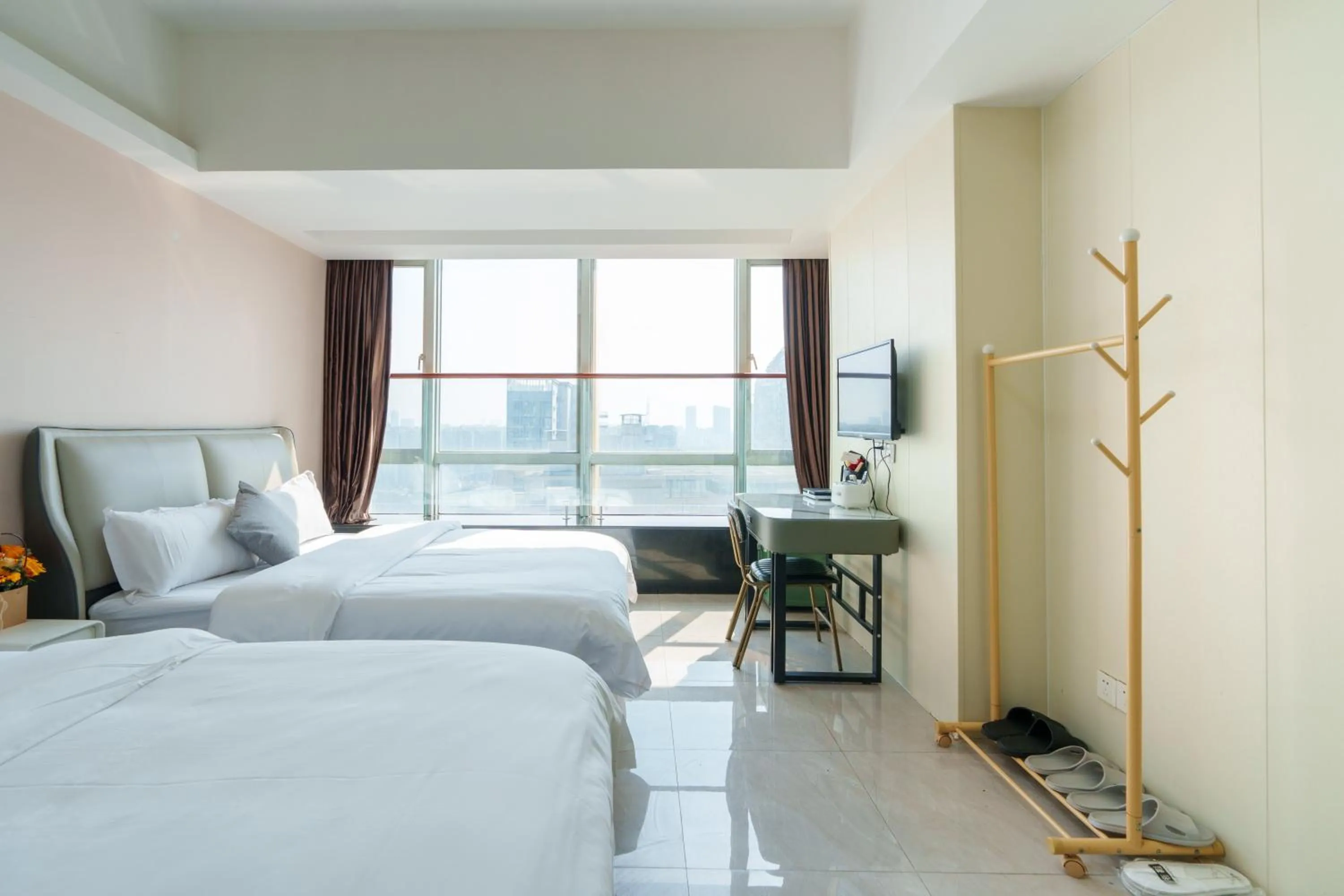 Photo of the whole room, Bed in Sunny International Apartment From Beijing Road