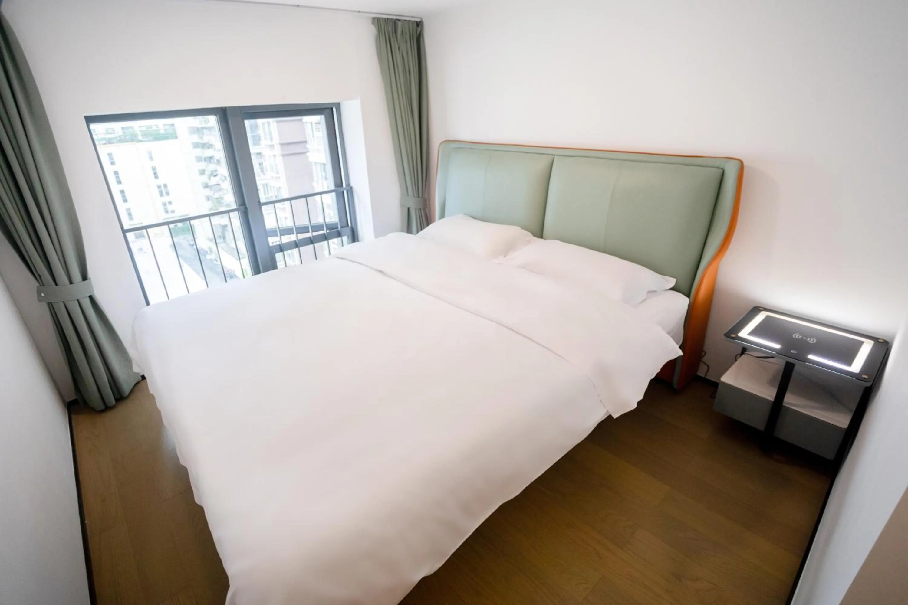 Bedroom, Bed in Sunny International Apartment From Beijing Road