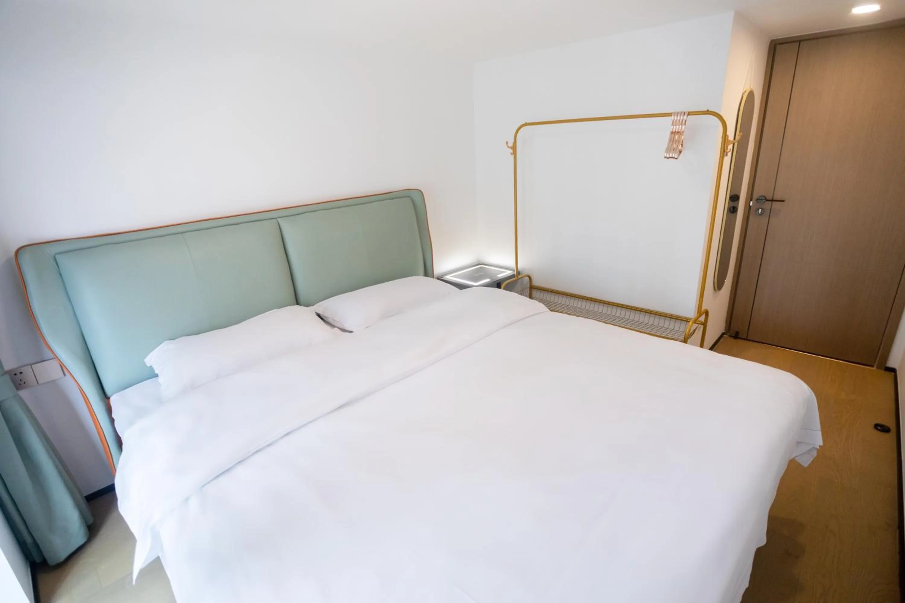 Bedroom, Bed in Sunny International Apartment From Beijing Road