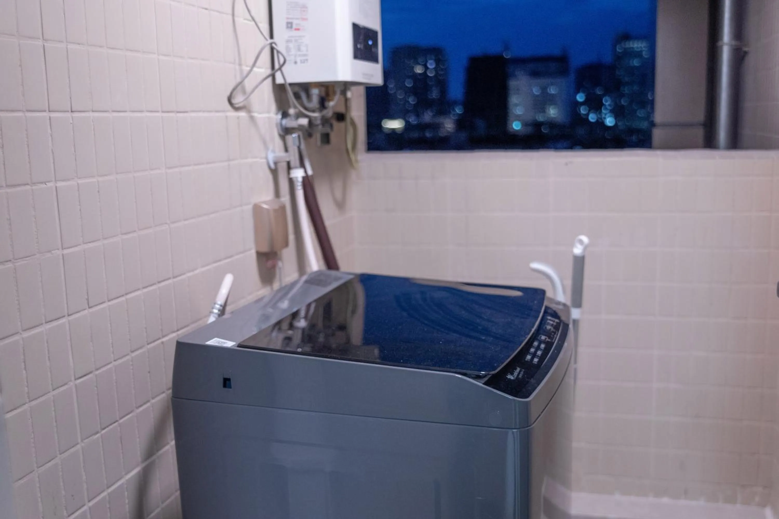 washing machine in Sunny International Apartment From Beijing Road