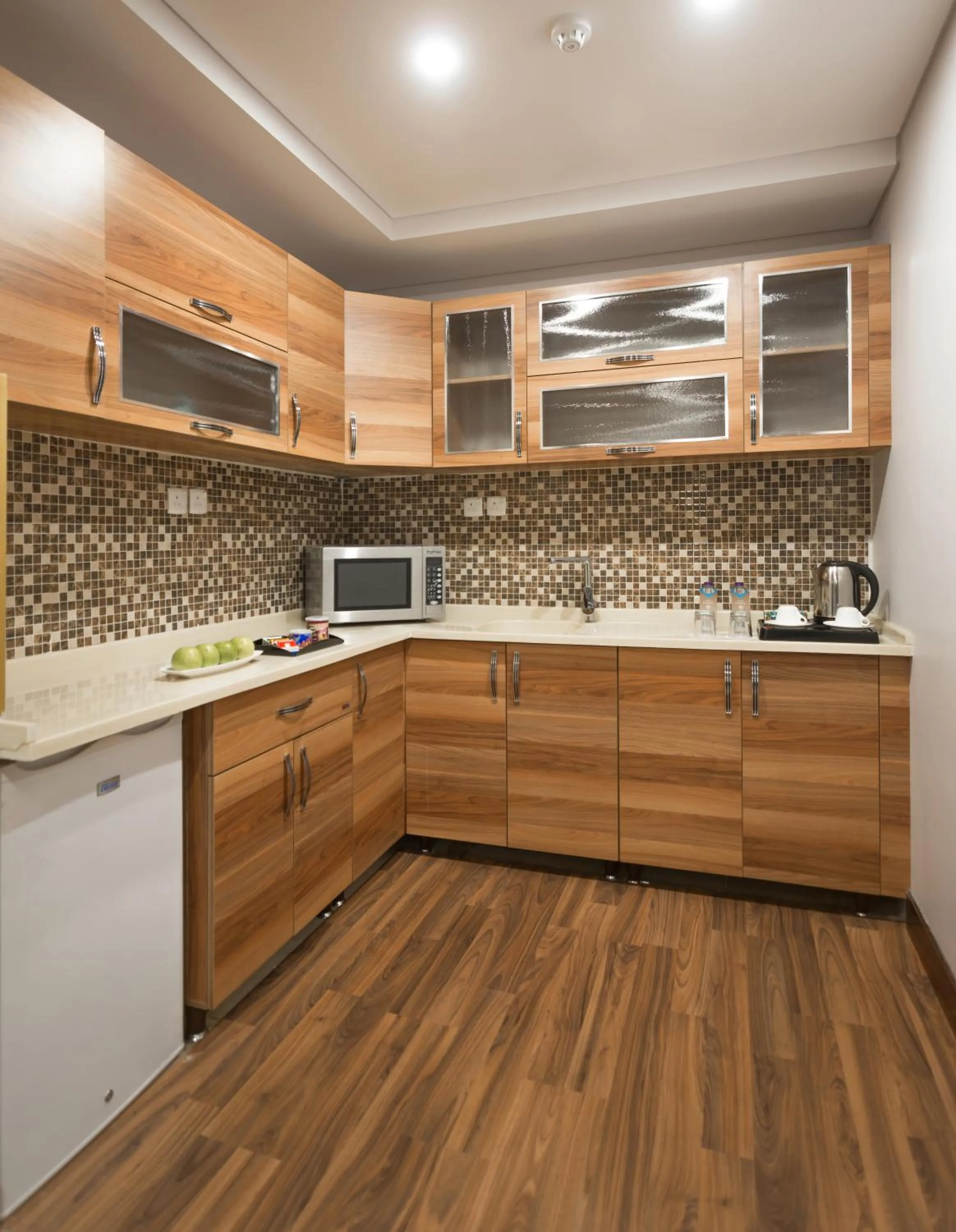 Kitchen or kitchenette in Le Park Concord Hotel