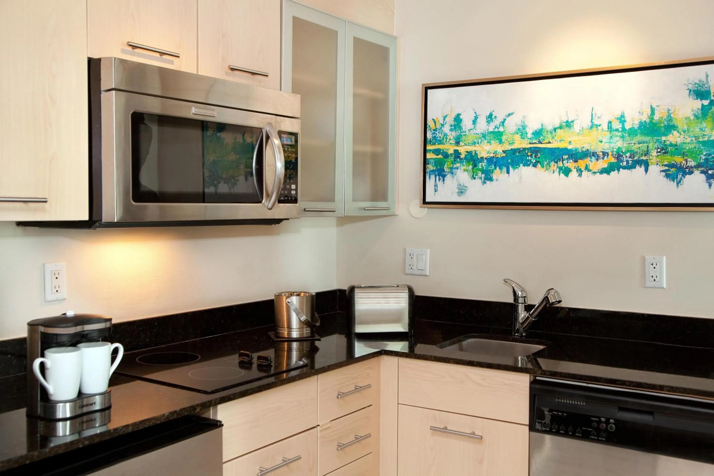 Kitchen or kitchenette in GALLERY One - A DoubleTree Suites by Hilton Hotel