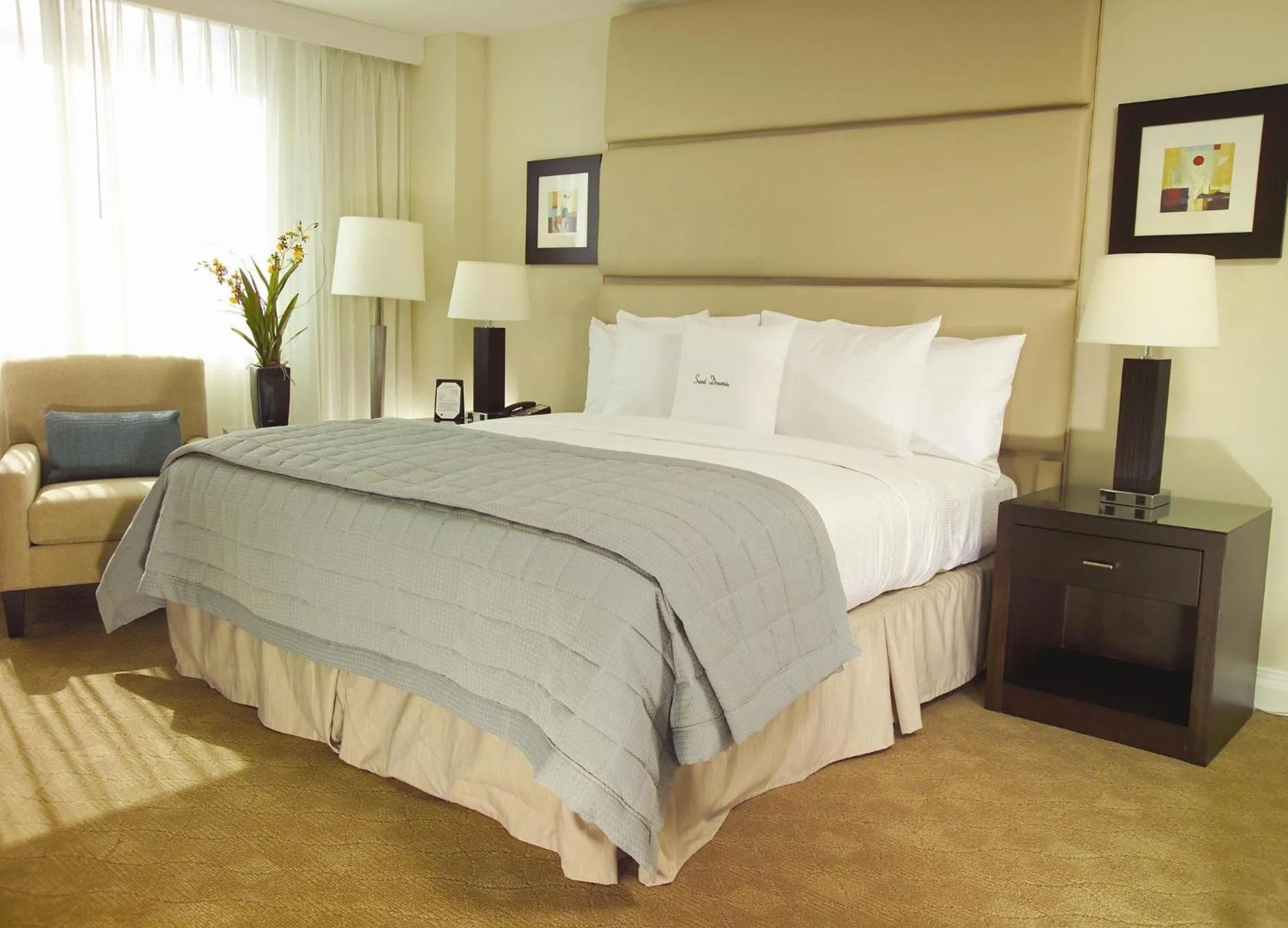 Bed in GALLERY One - A DoubleTree Suites by Hilton Hotel