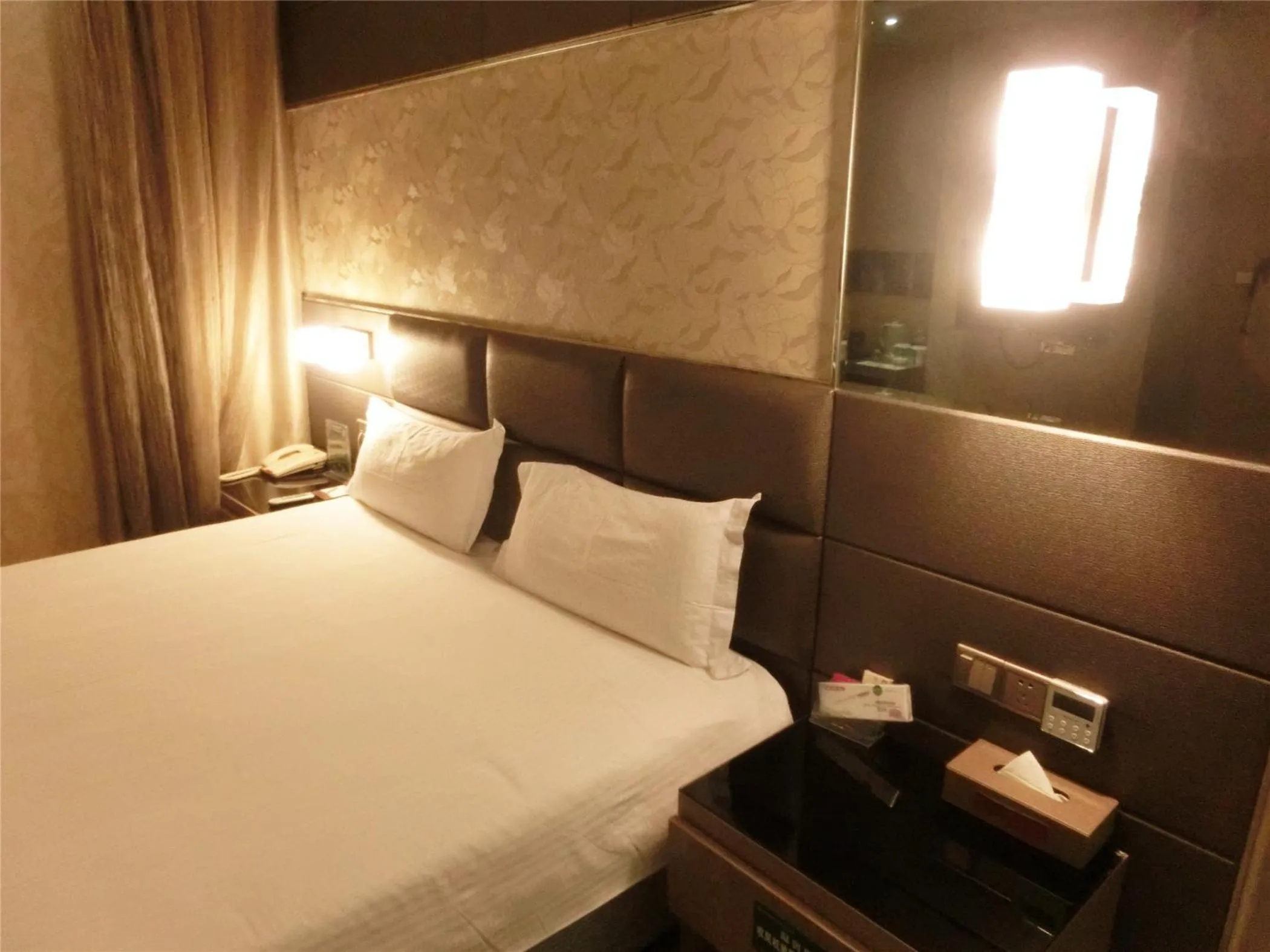 Bed in Greentree Alliance Shenzhen Shekou Sea World Hotel