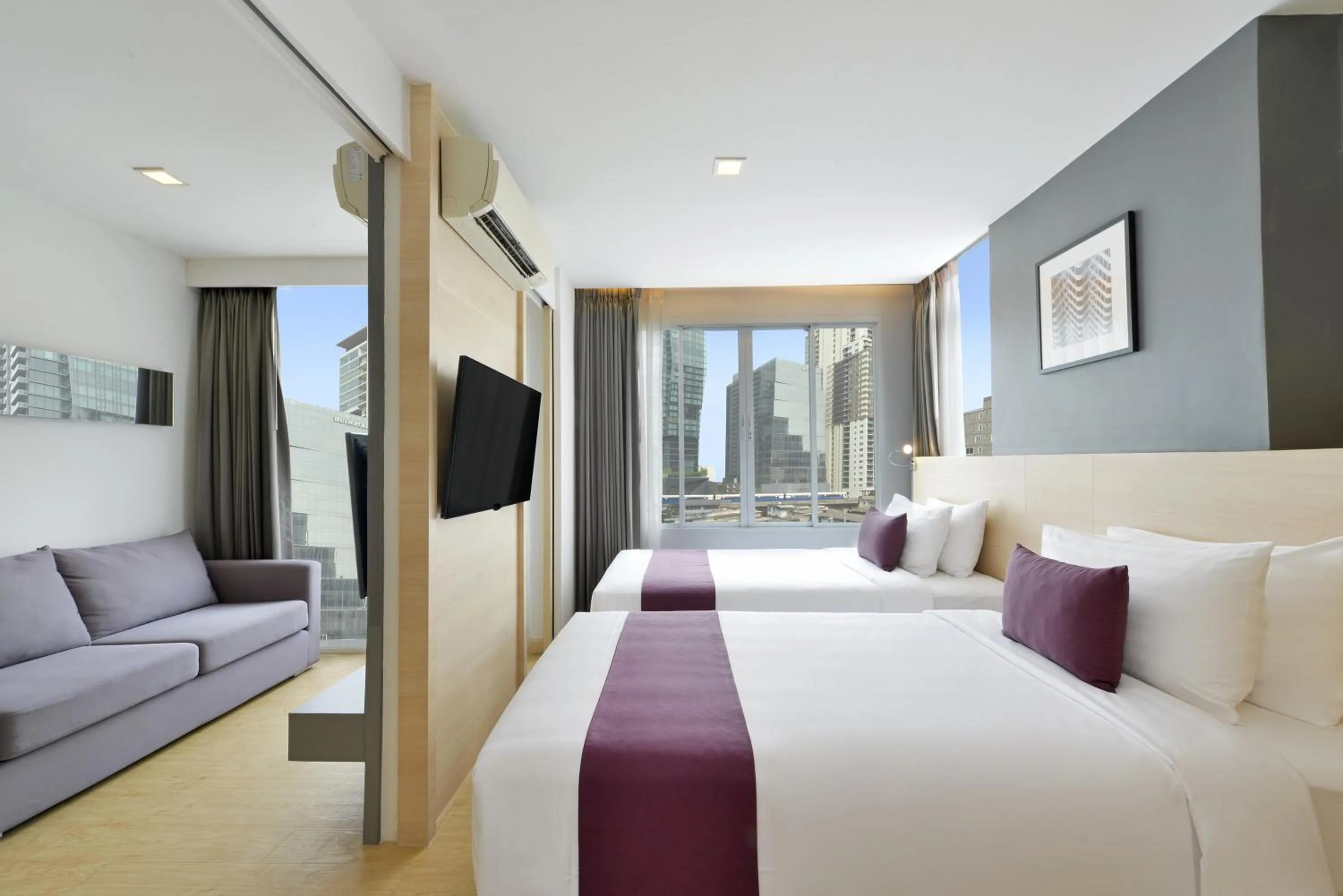 Bed in Arize Hotel Sukhumvit