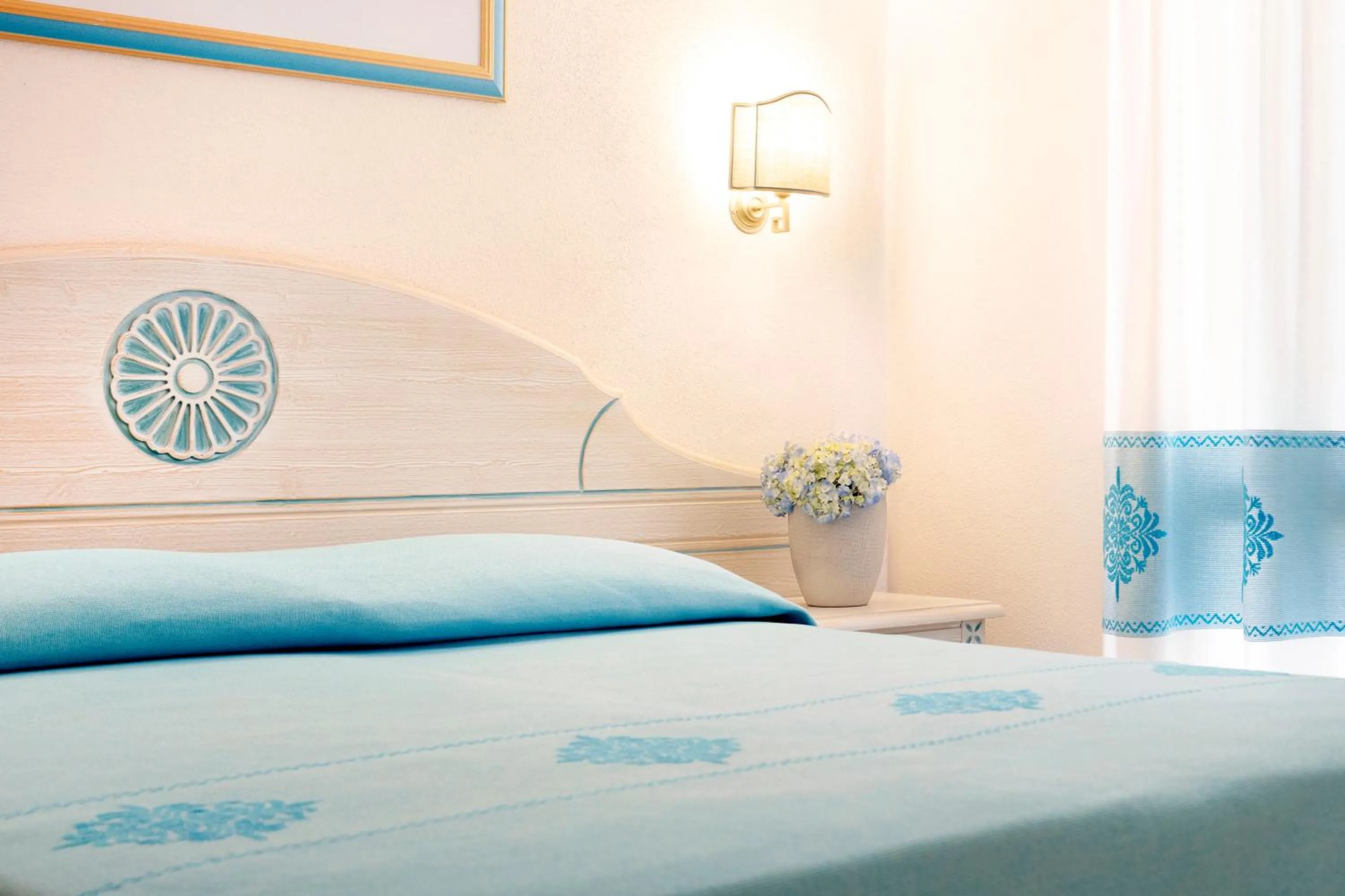 Bed in Club Hotel Cormorano