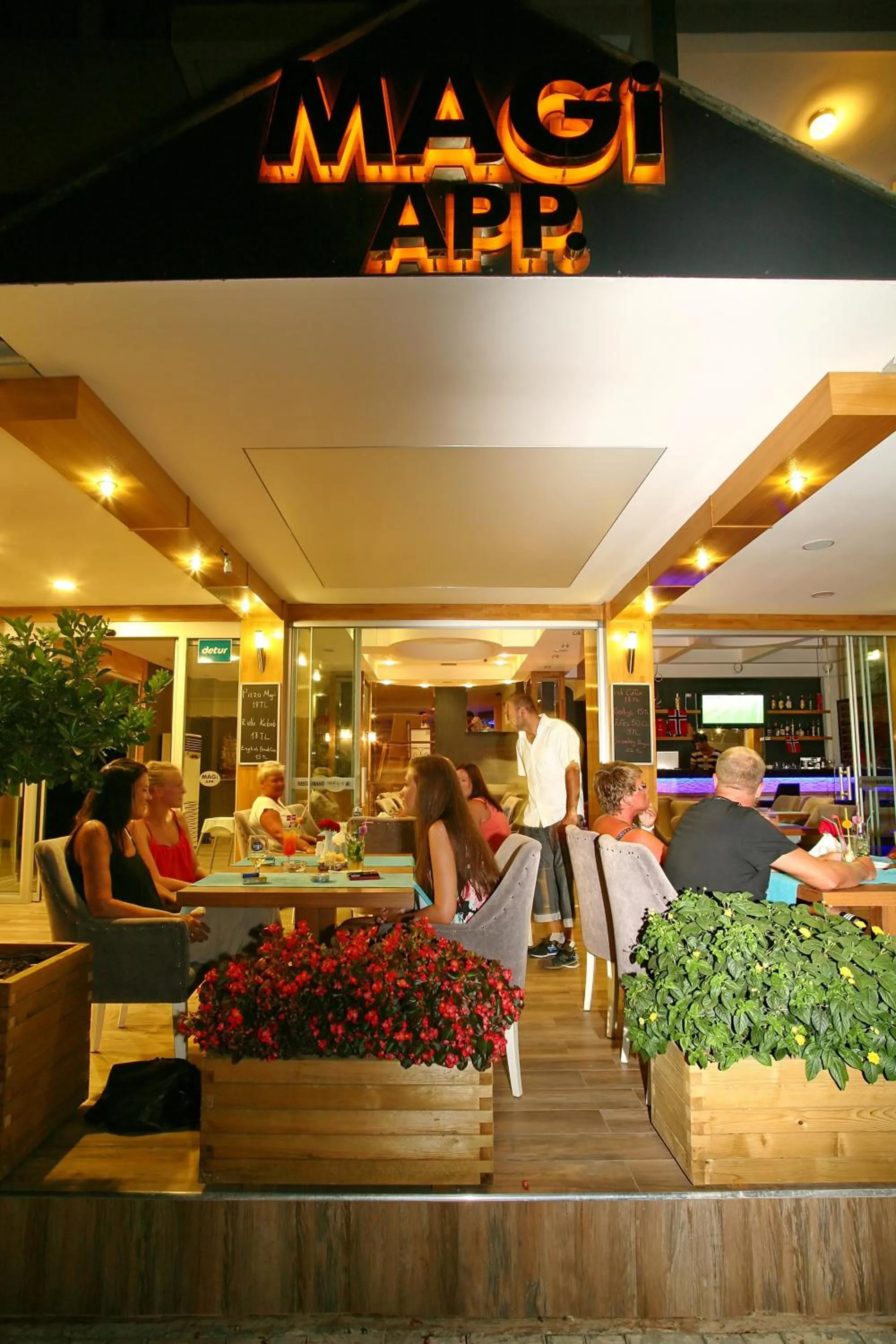 Property logo or sign in Magi Apart Hotel