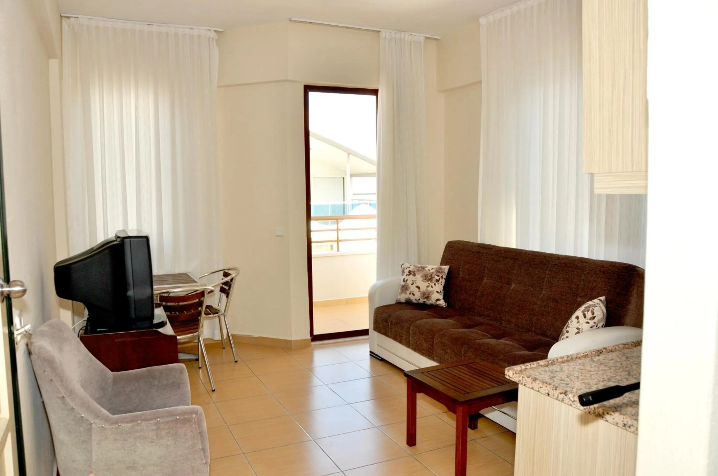 Living room in Magi Apart Hotel