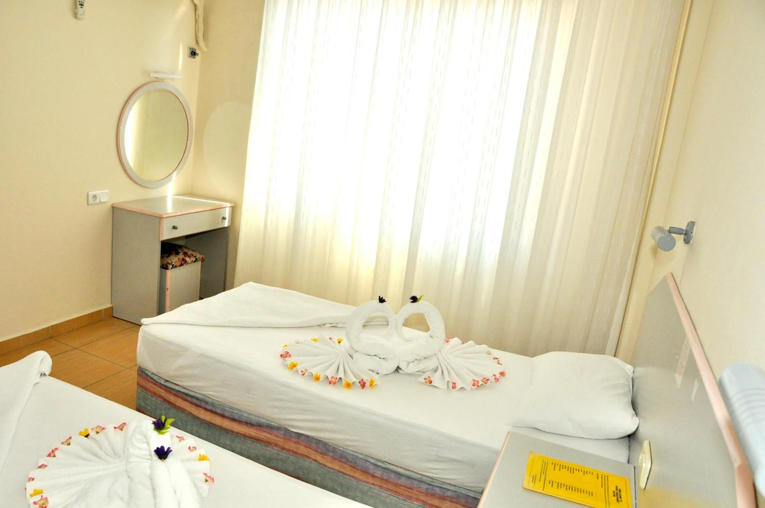 Bed in Magi Apart Hotel