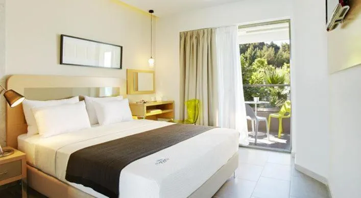 Photo of the whole room, Bed in Margarita Sea Side Hotel