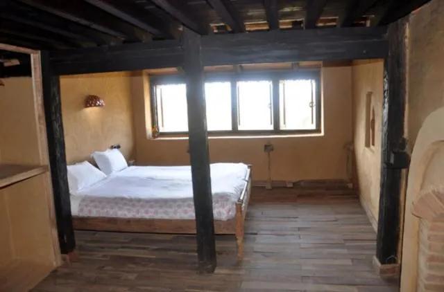 Photo of the whole room, Bed in Gaun Ghar Pvt Ltd