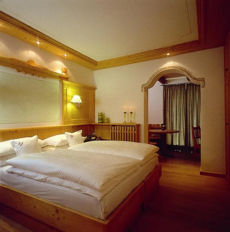 Bedroom, Bed in Hotel Patrizia Dolomites Glamour