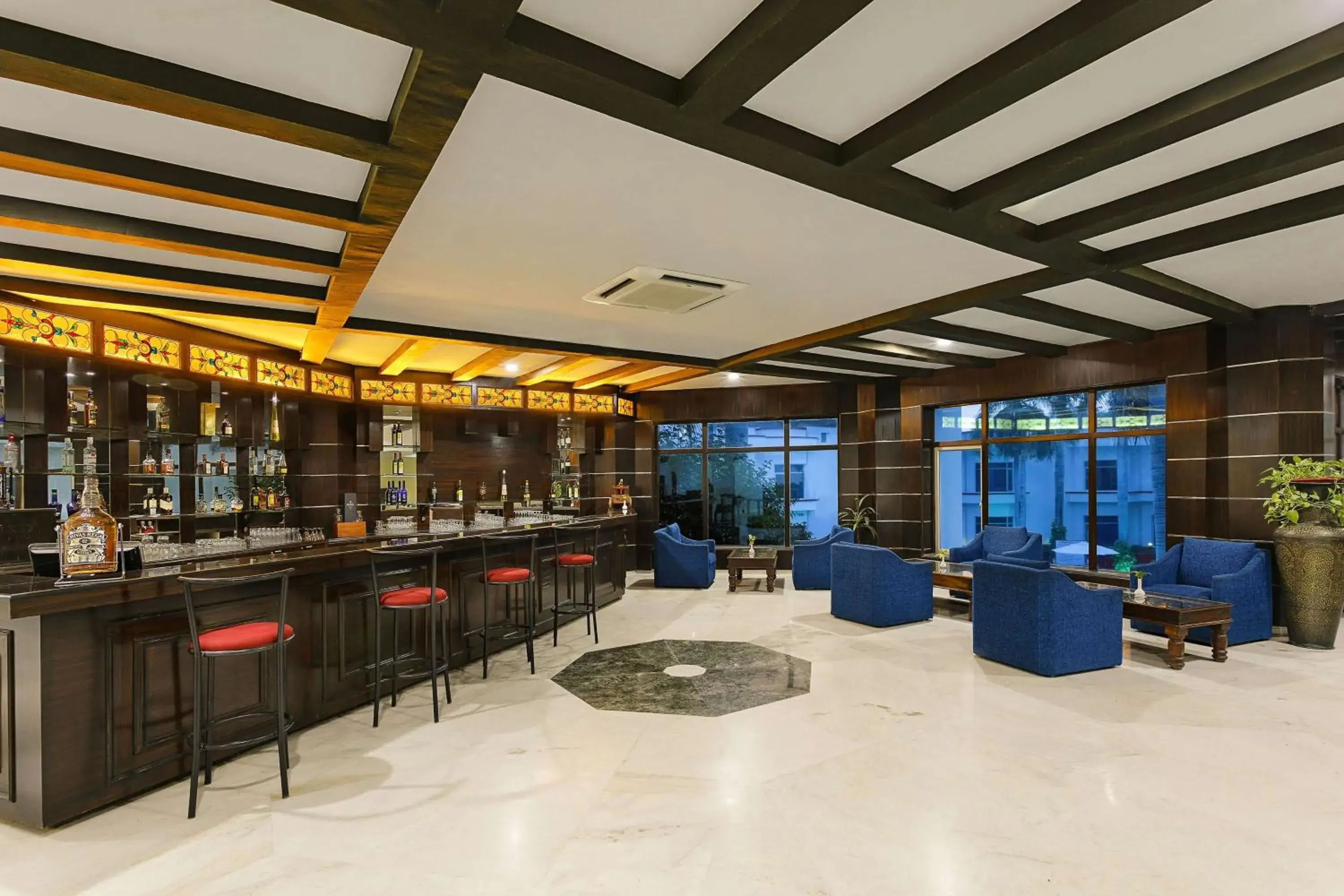 Lounge or bar in Ramada Khajuraho Lounge or bar in Ramada Khajuraho