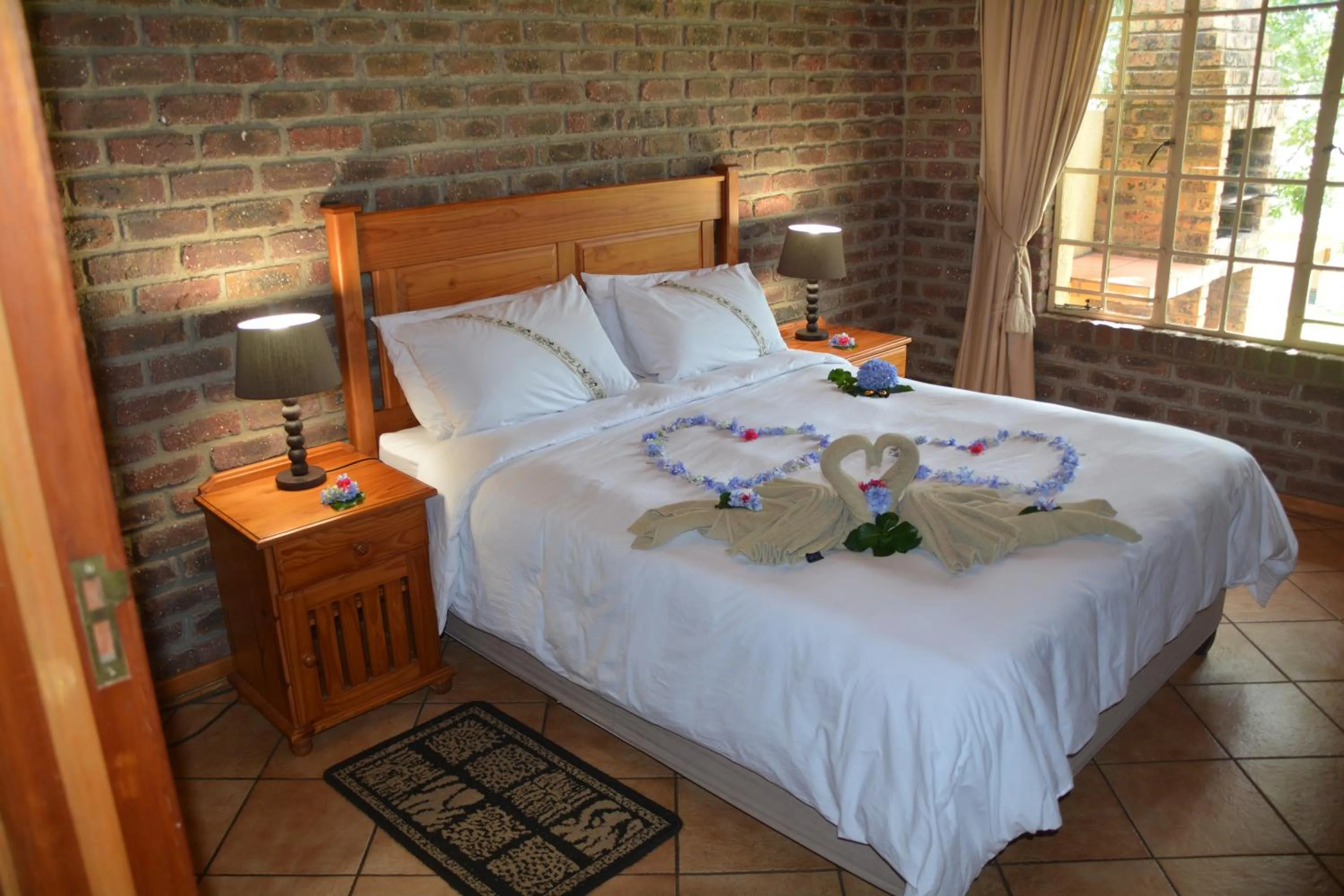 Decorative detail, Bed in Thaba Tsweni Lodge & Safaris