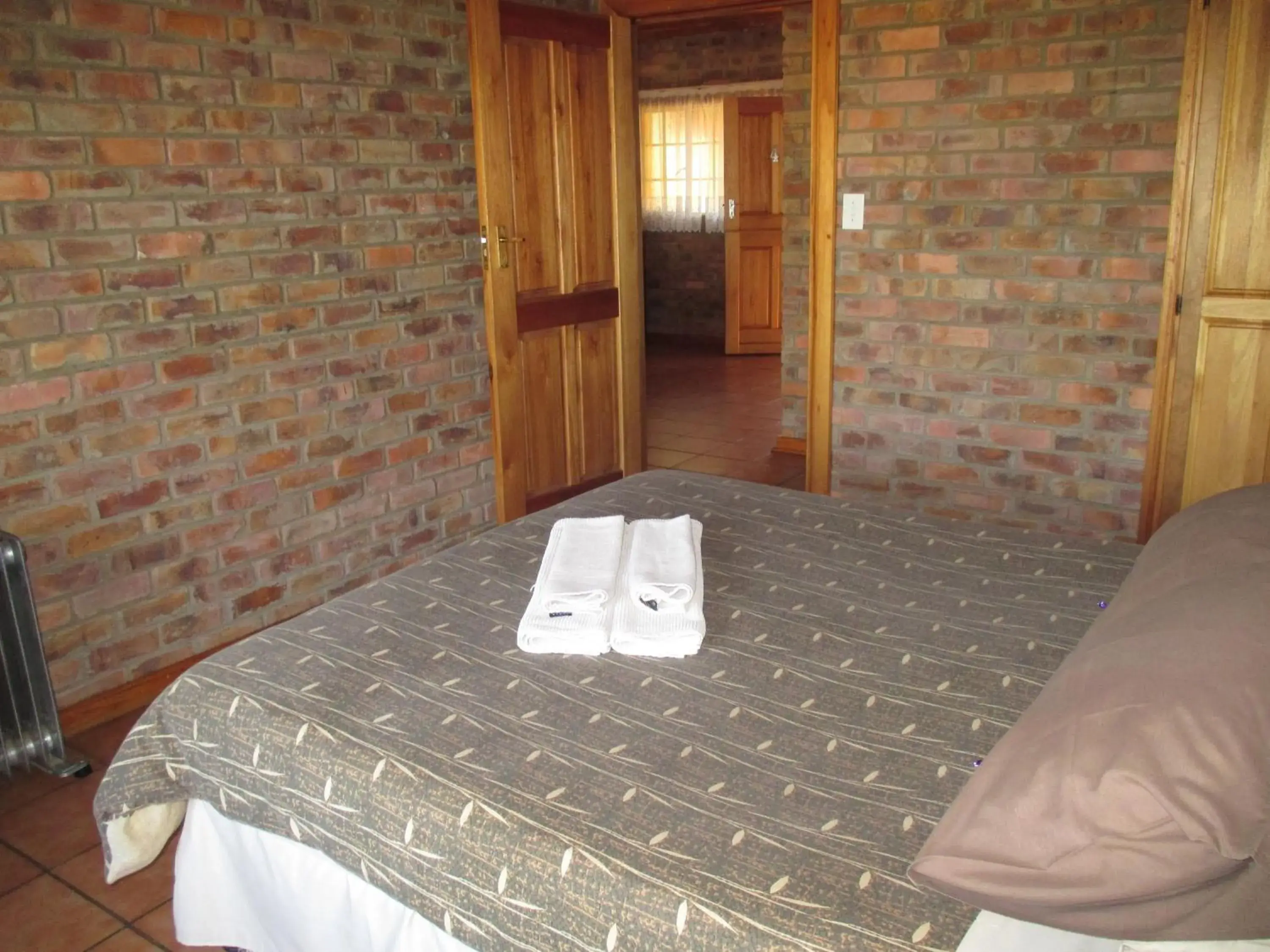 Bed in Thaba Tsweni Lodge & Safaris Bed in Thaba Tsweni Lodge & Safaris