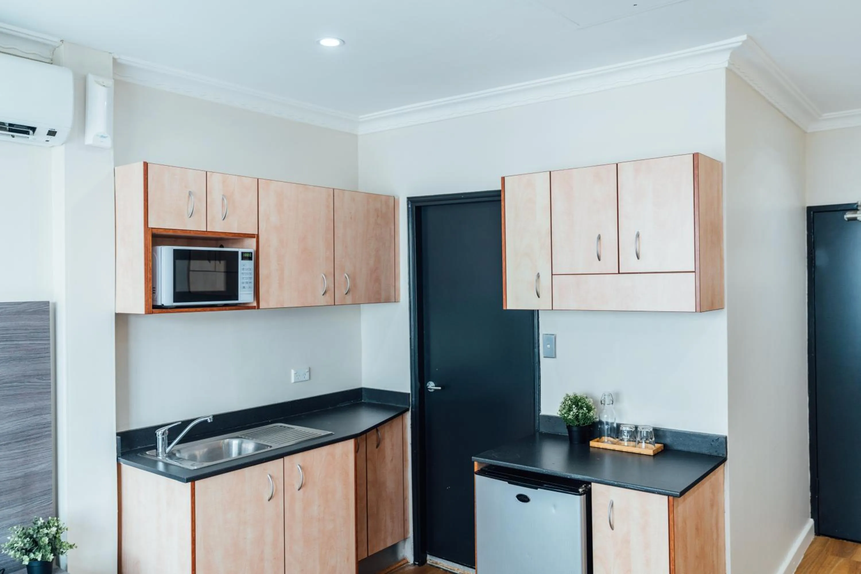 Kitchen or kitchenette in UNO Hotel Sydney