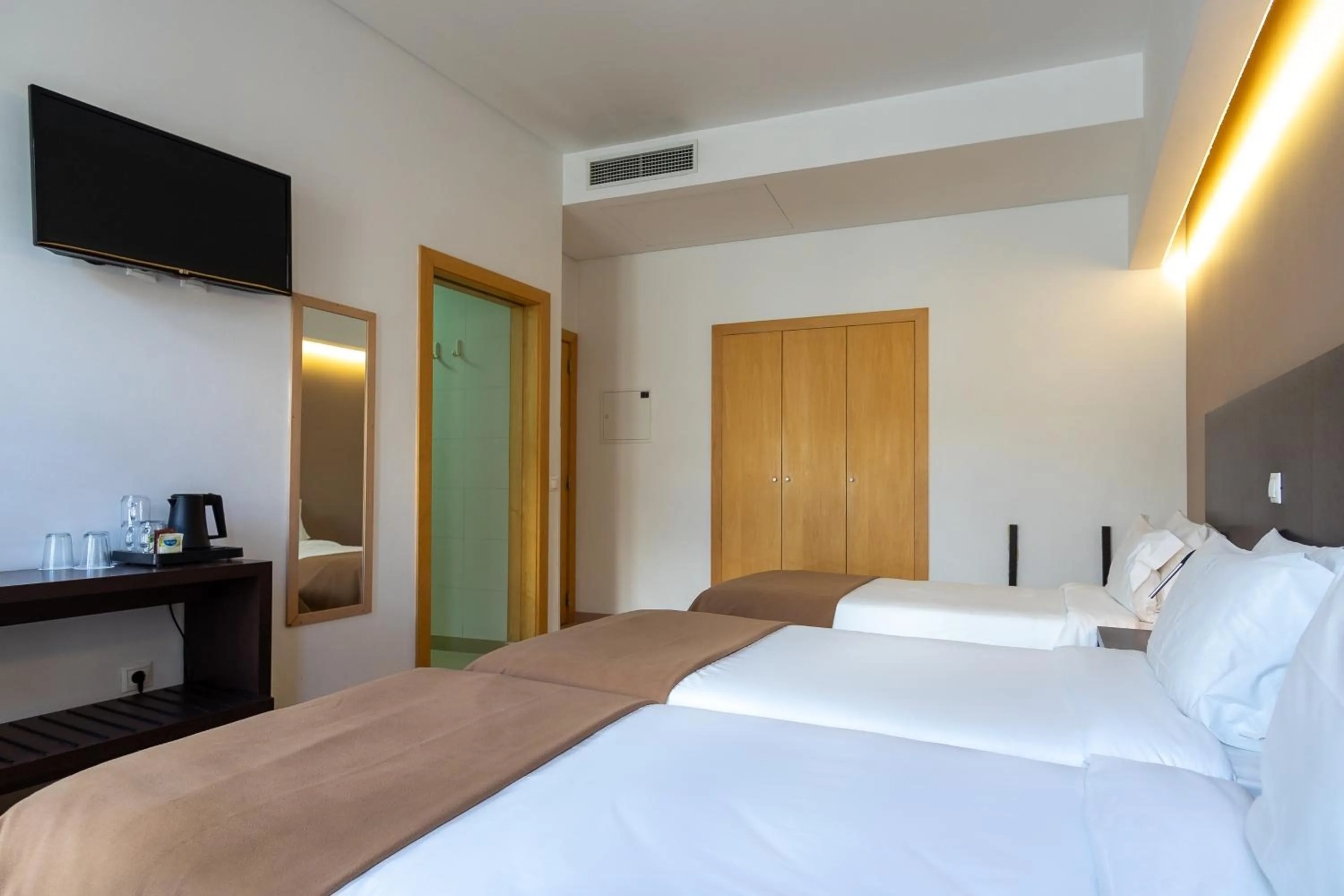 Bed in Hotel Vitória