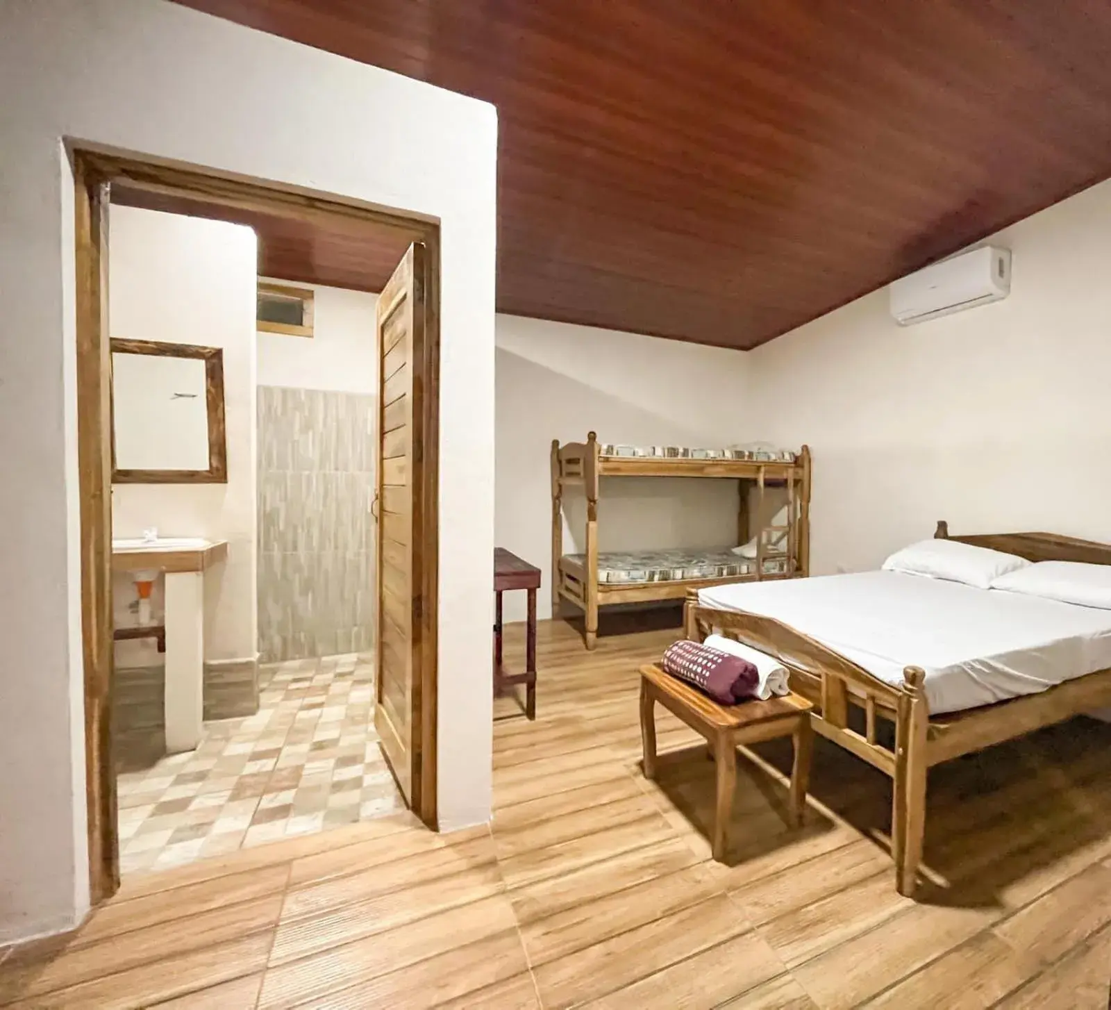 Comfort Quadruple Room in Badaboom Hostal & Surf Comfort Quadruple Room in Badaboom Hostal & Surf