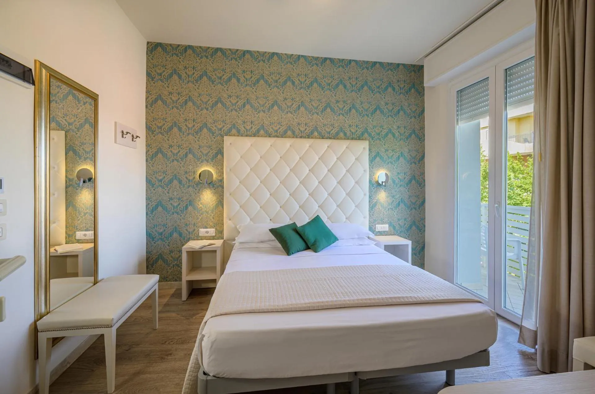 Bed in Hotel Acquamarina