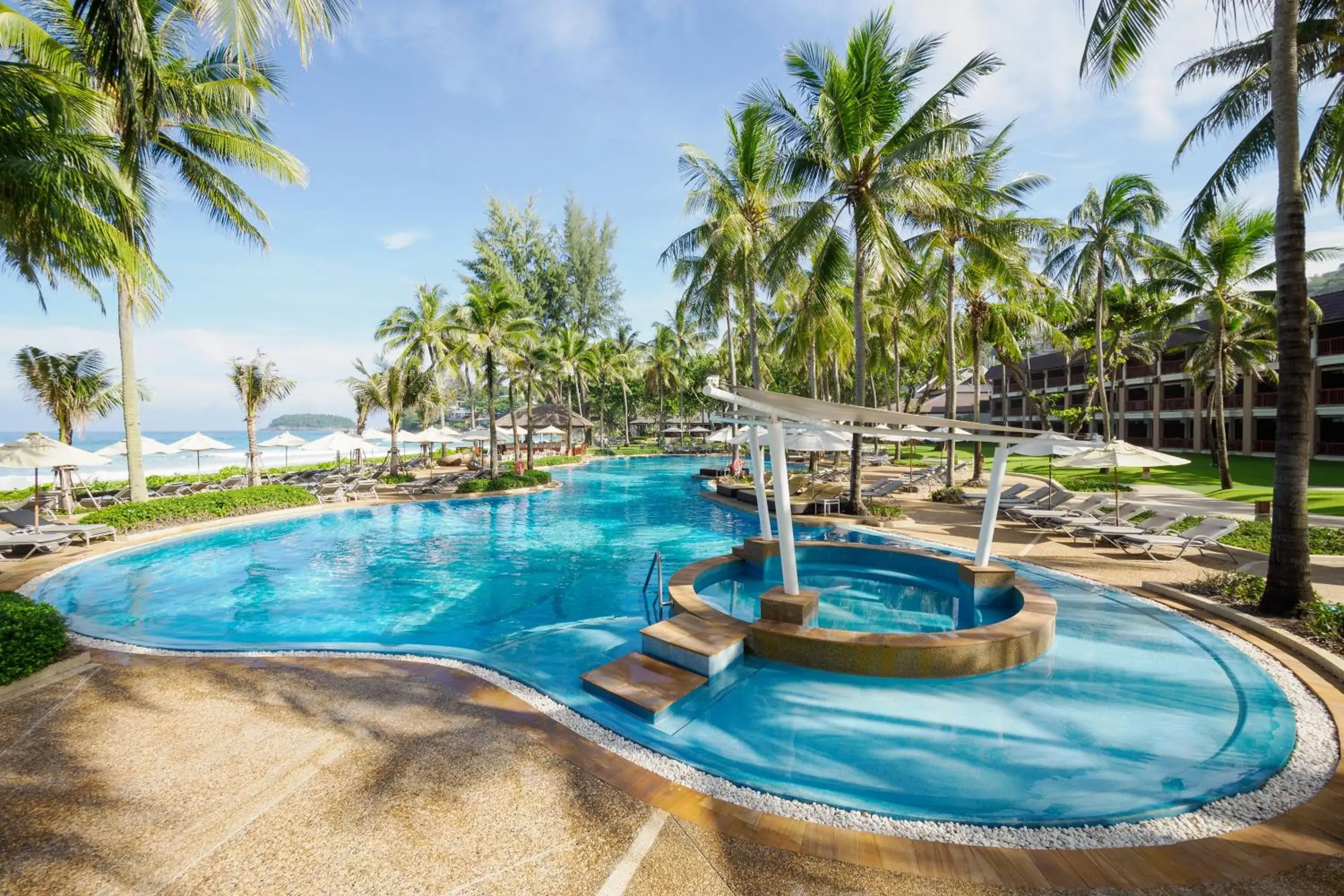 Swimming pool in Katathani Phuket Beach Resort - SHA Extra Plus Swimming pool in Katathani Phuket Beach Resort - SHA Extra Plus