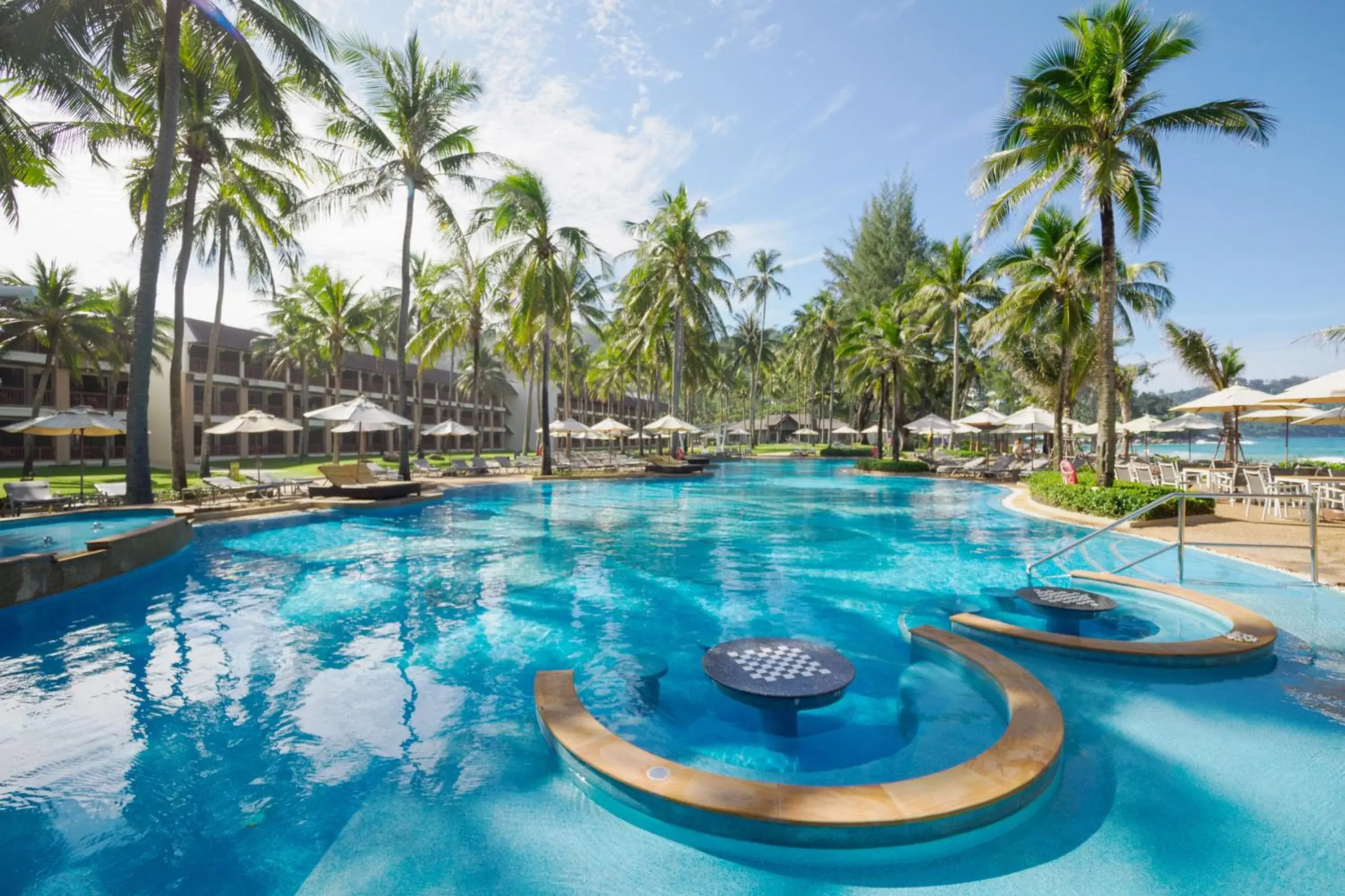 Swimming pool in Katathani Phuket Beach Resort - SHA Extra Plus Swimming pool in Katathani Phuket Beach Resort - SHA Extra Plus