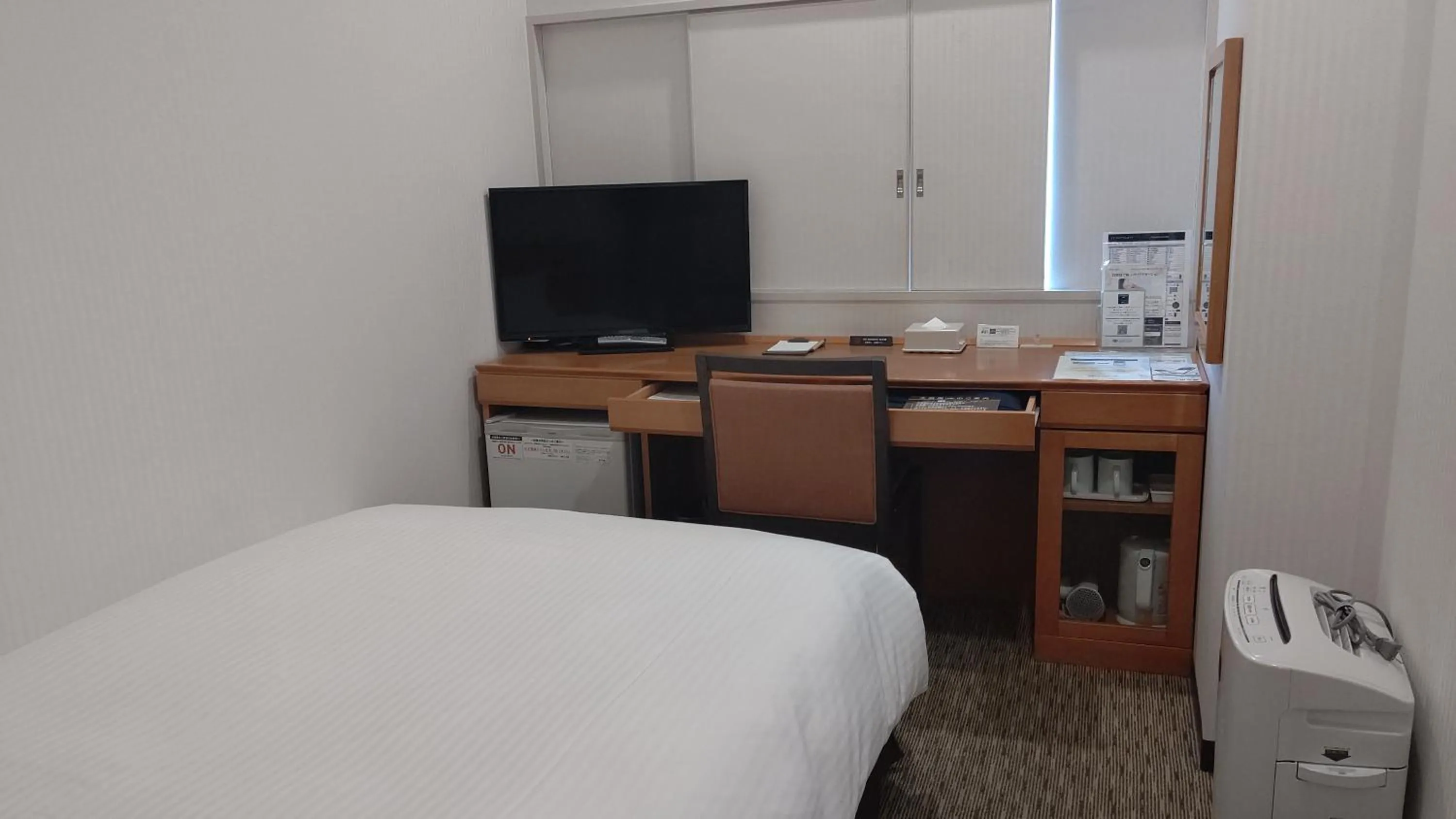 Photo of the whole room, Bed in Nishitetsu Inn Kurosaki