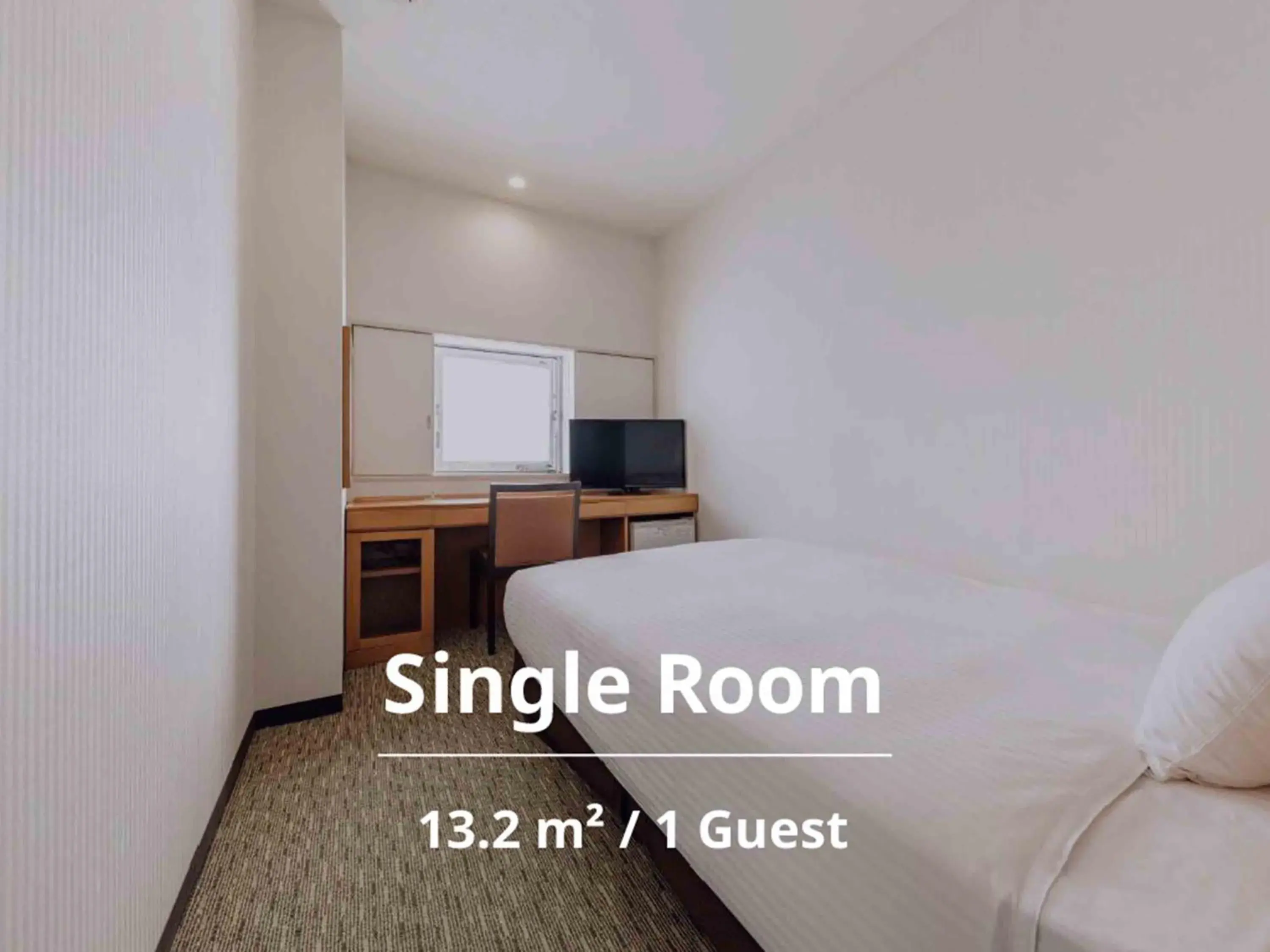 Bed in Nishitetsu Inn Kurosaki Bed in Nishitetsu Inn Kurosaki