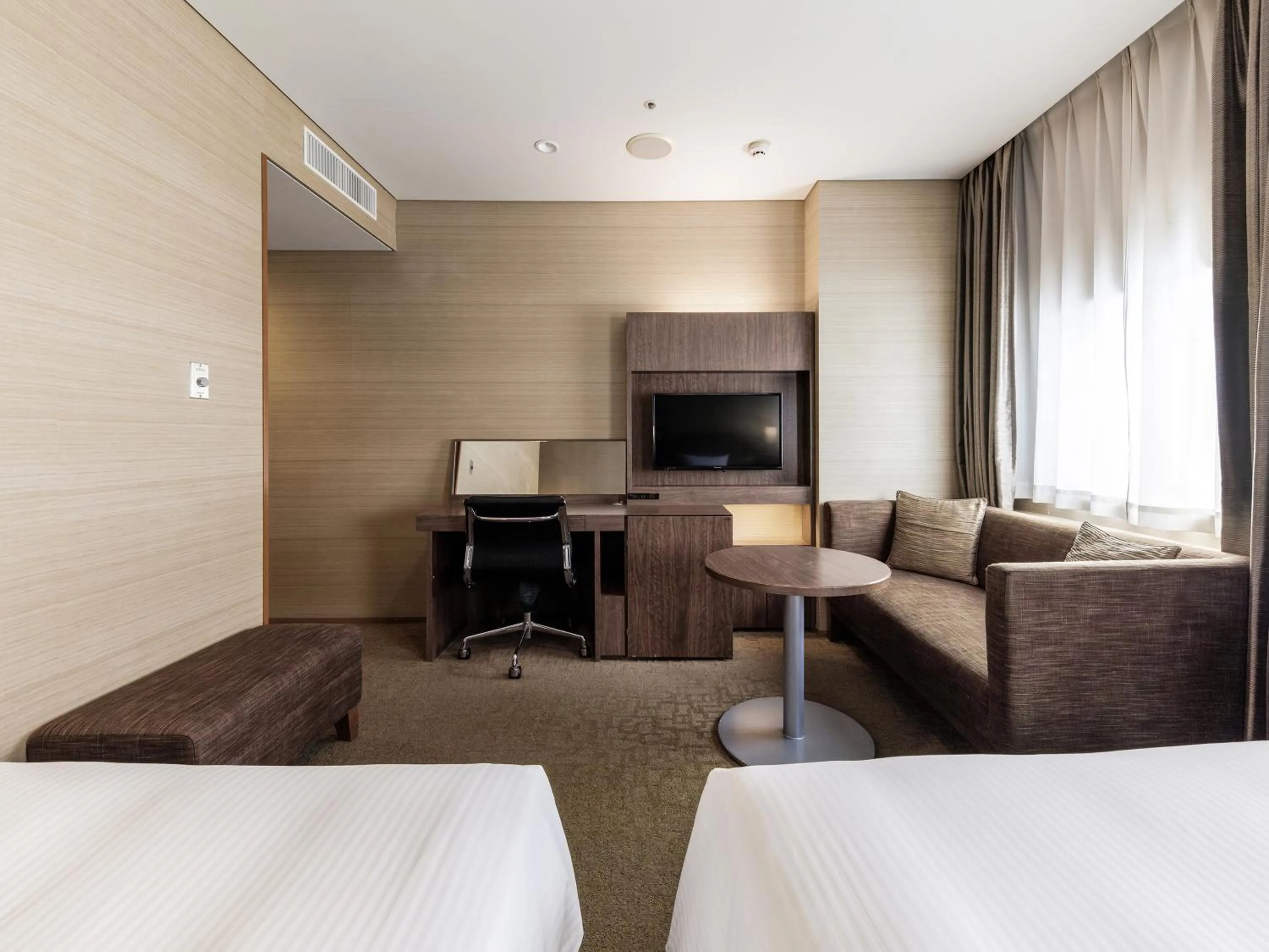 Photo of the whole room, Bed in Nishitetsu Inn Kurosaki