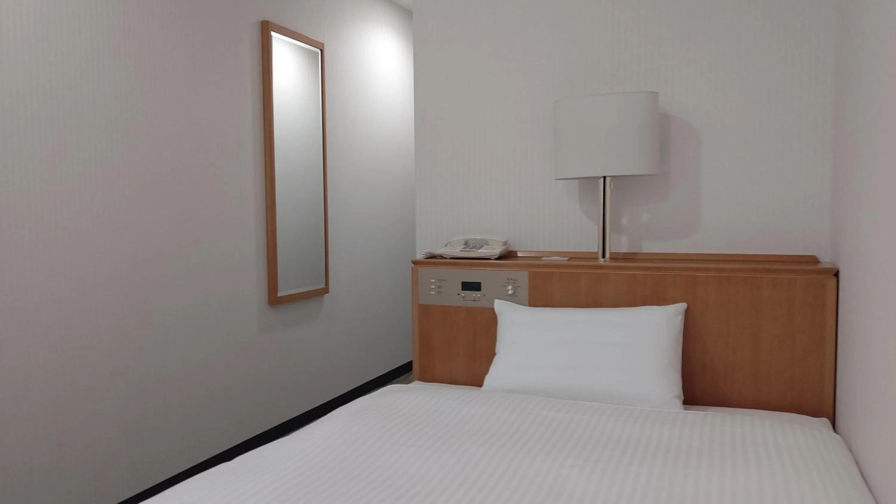 Photo of the whole room, Bed in Nishitetsu Inn Kurosaki